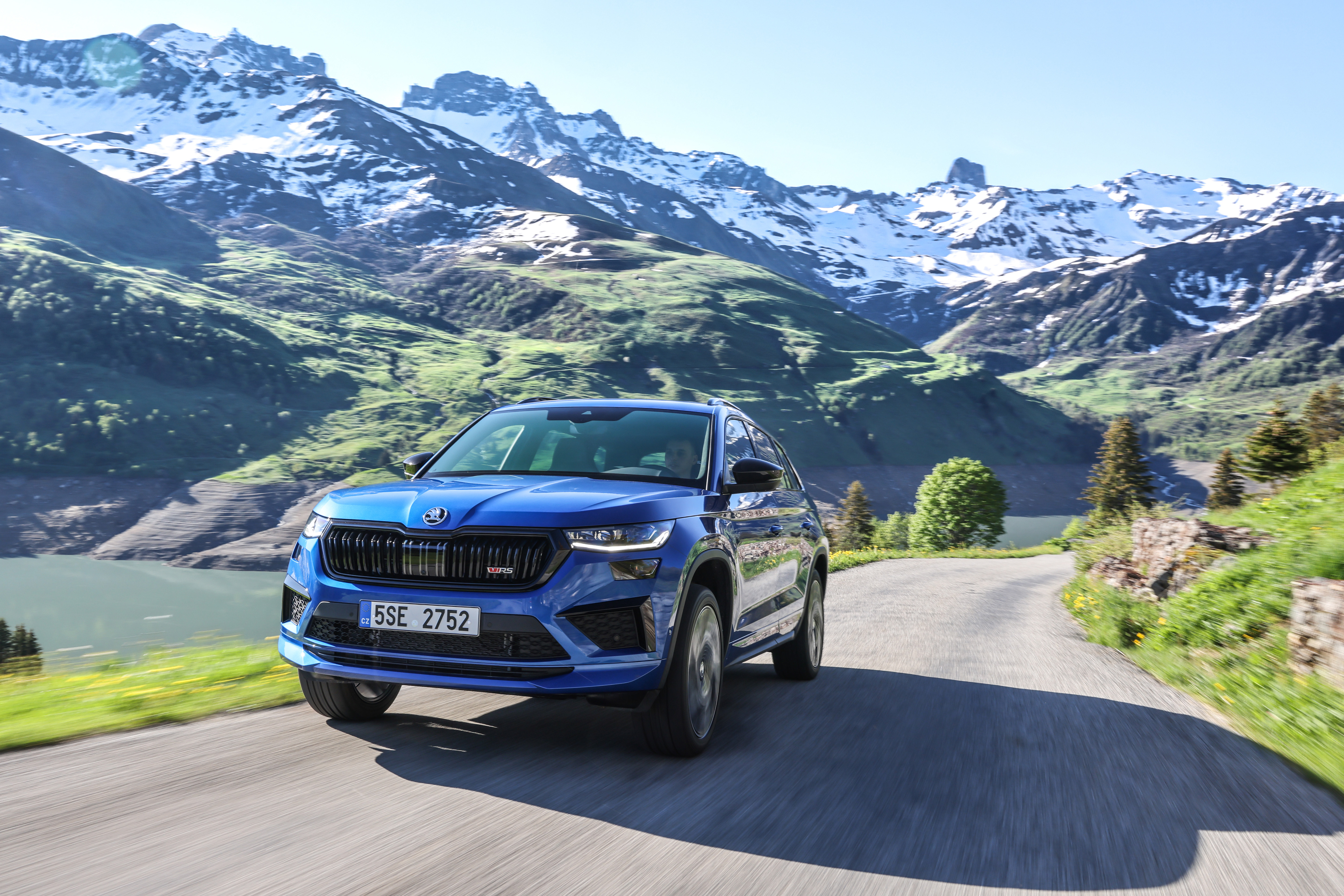 2021 Skoda Kodiaq RS driving on mountain road HD Wallpaper