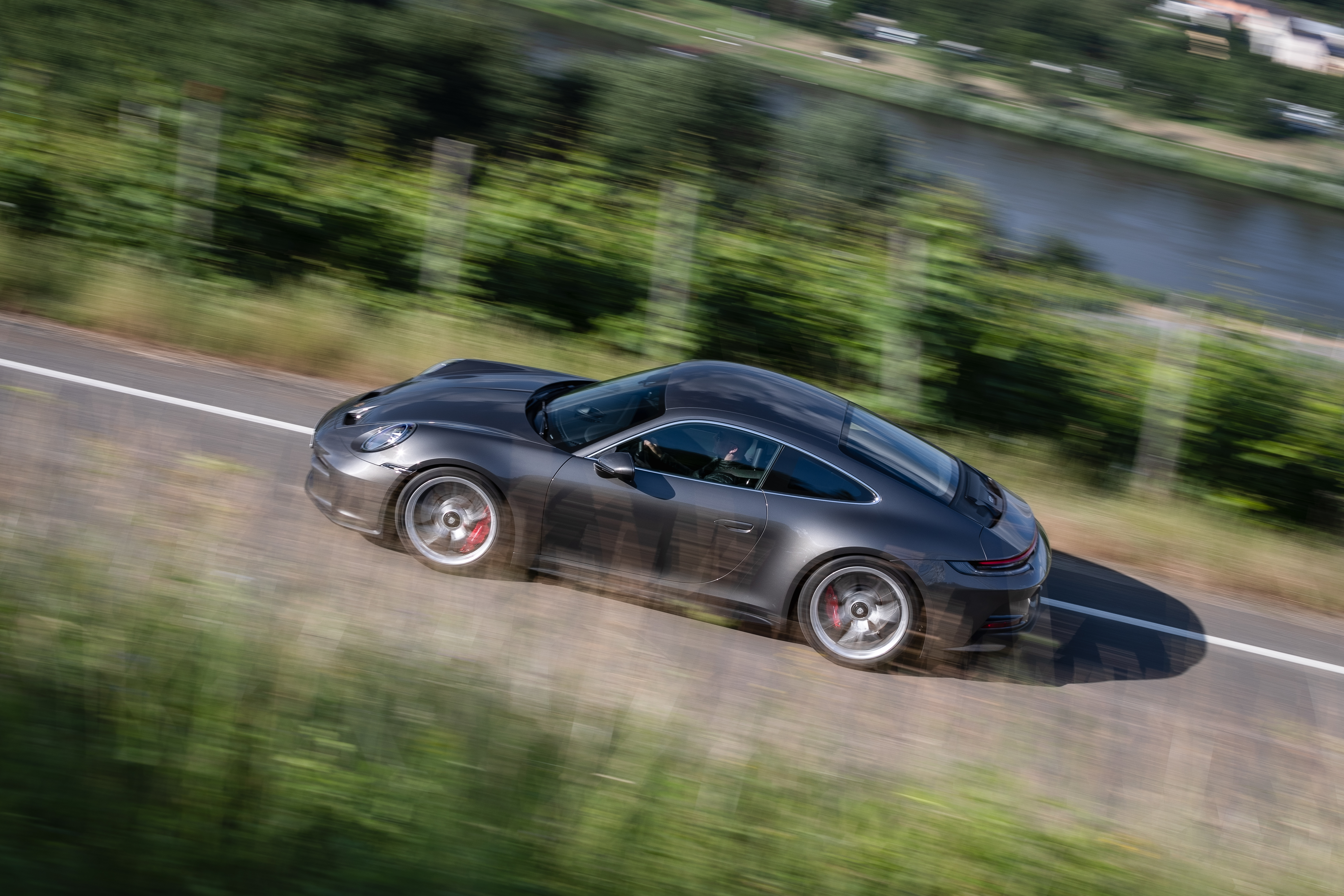 2021 Porsche 911 GT3 Touring driving on a road HD Wallpaper