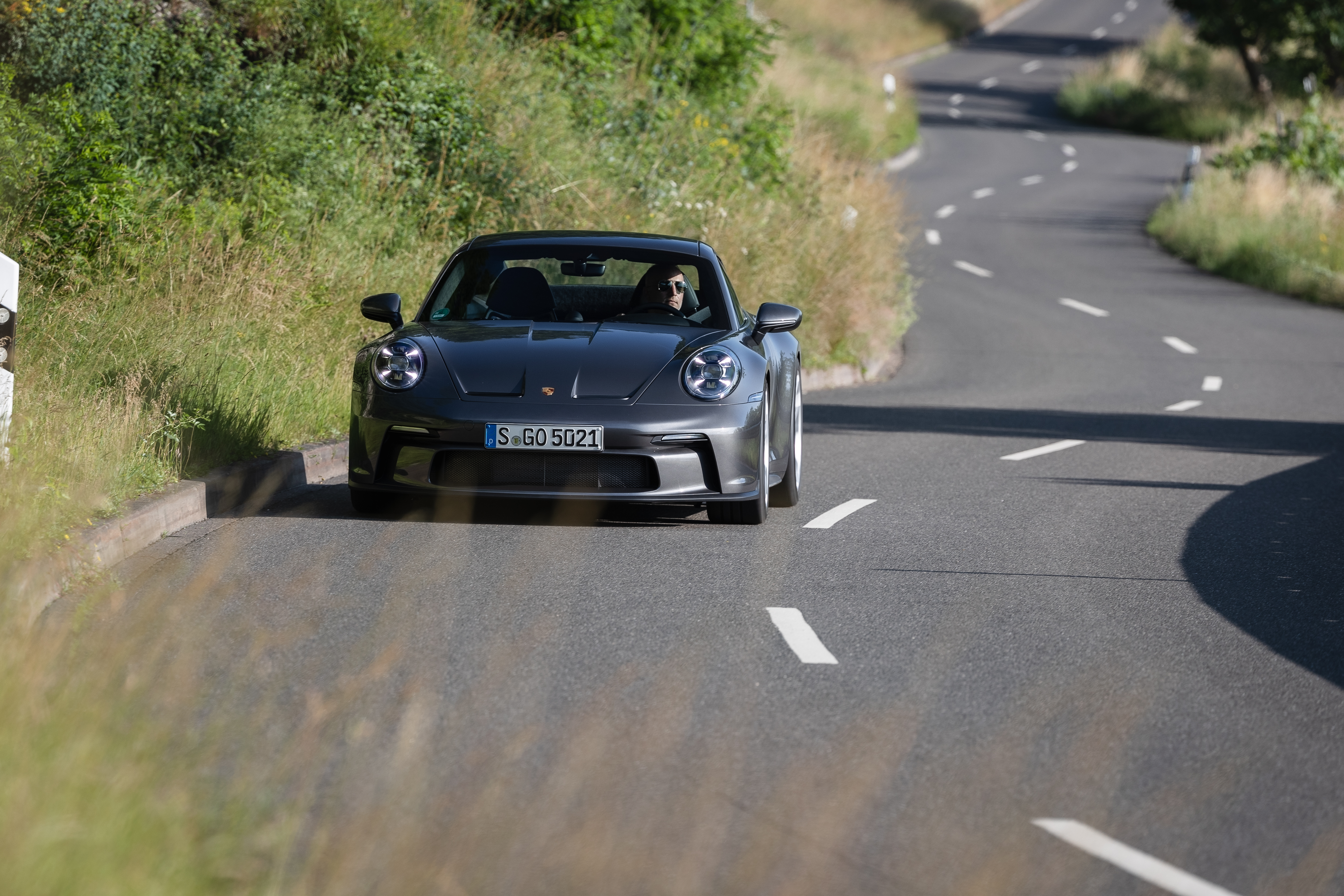 2021 Porsche 911 GT3 Touring on a winding road HD Wallpaper