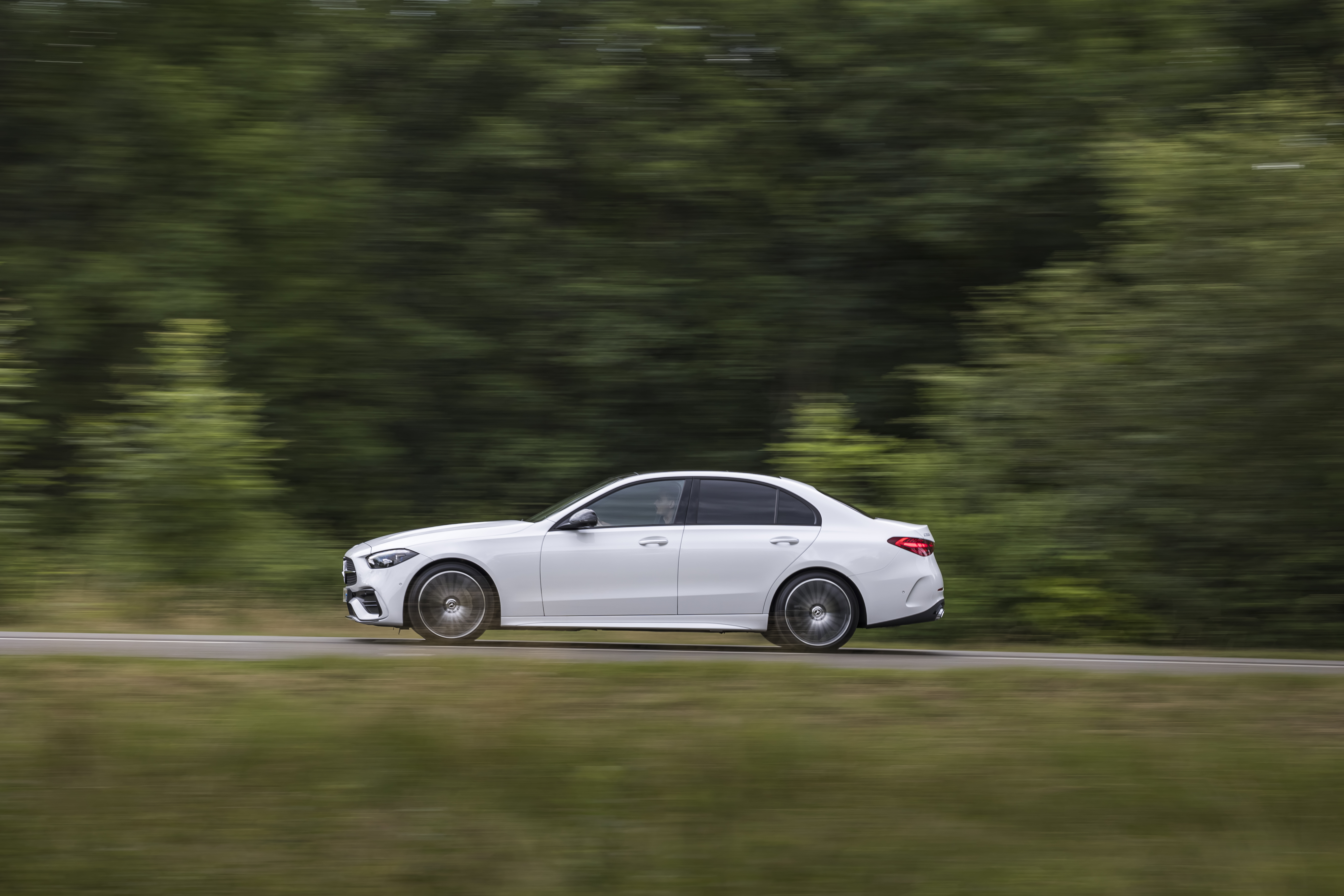 White Mercedes-Benz C 220 d AMG Line driving HD Wallpaper