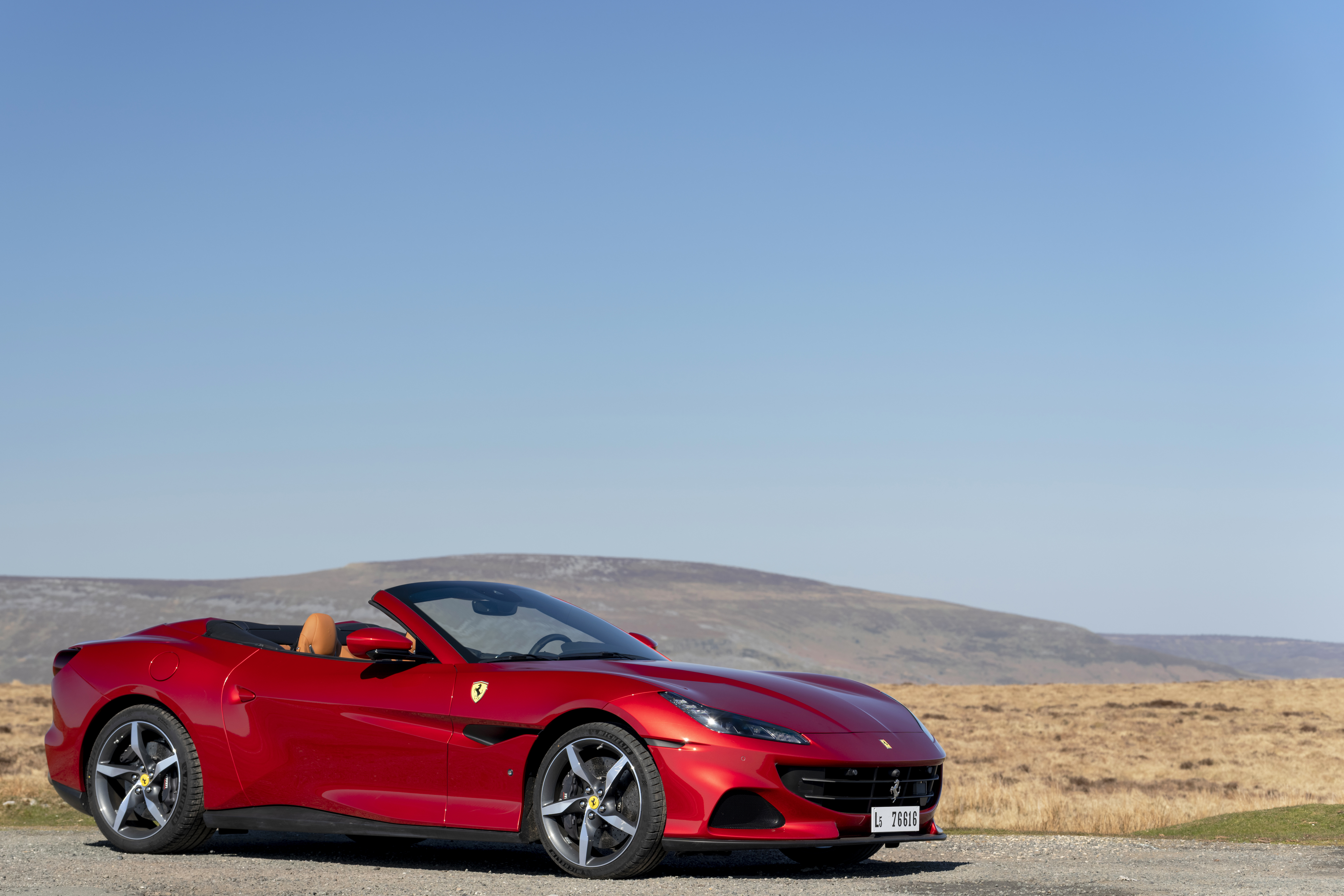 Red Ferrari Portofino M convertible supercar HD Wallpaper