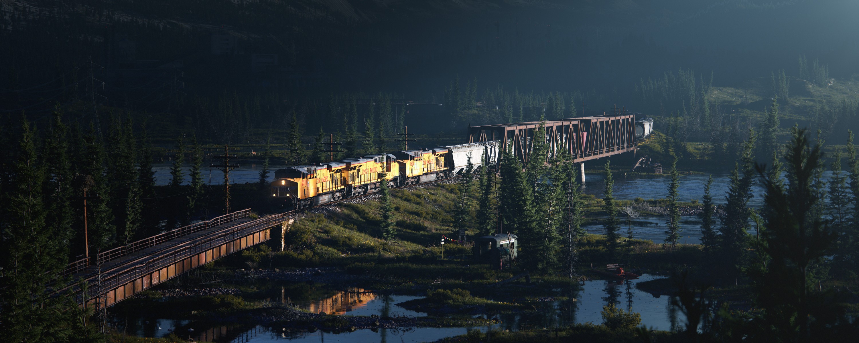 Train crossing a bridge over a river at night HD Wallpaper