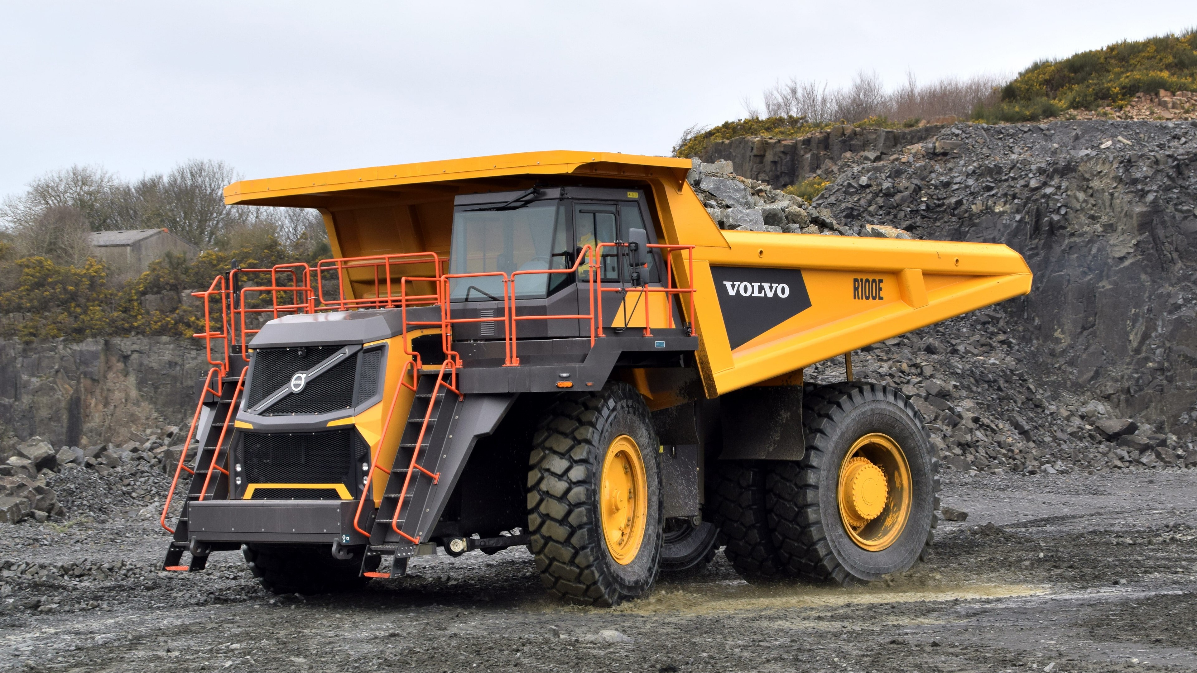 Volvo R100E Dump Truck in Mining Site HD Wallpaper