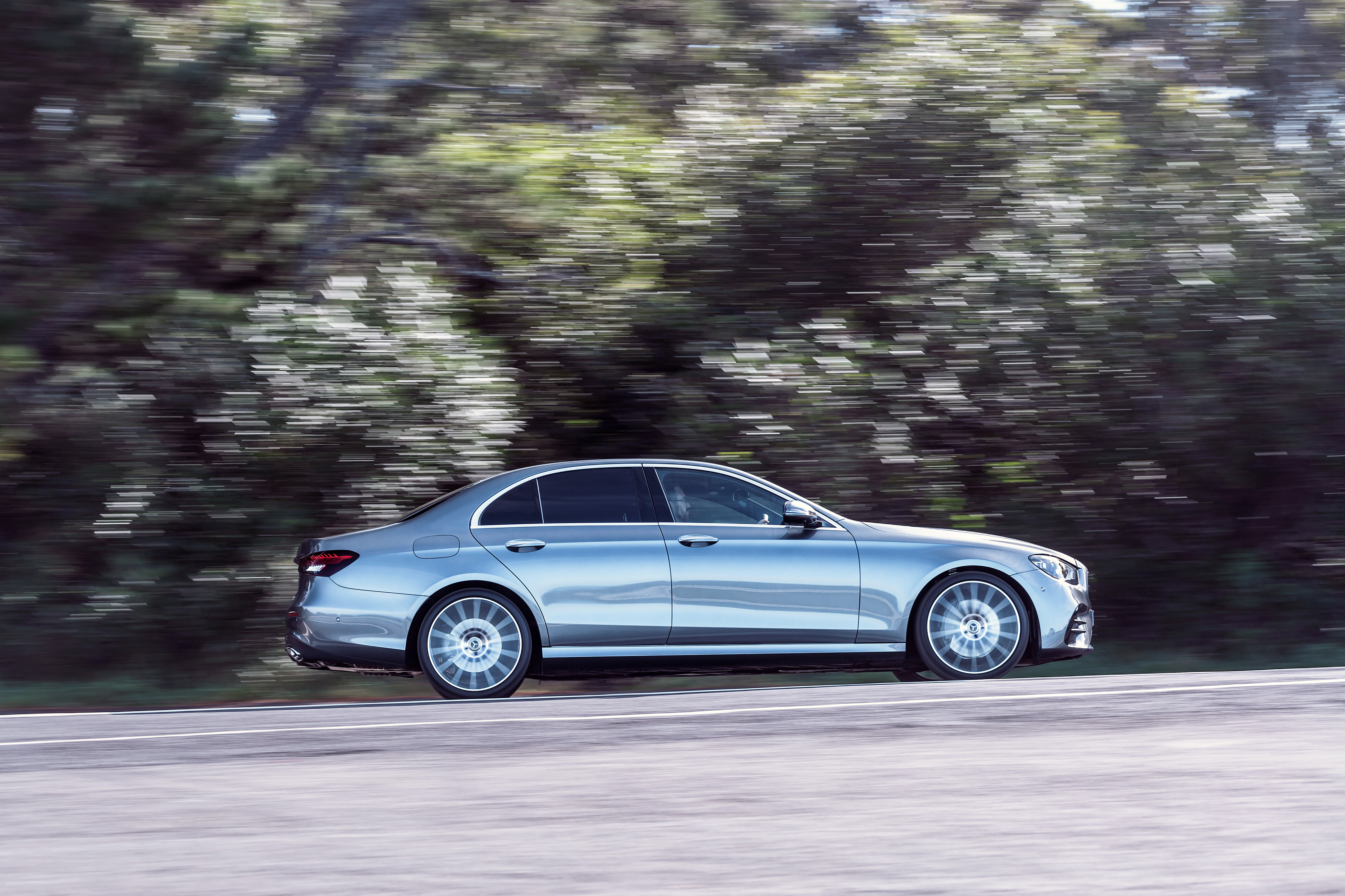 Silver Mercedes-Benz E 350 AMG Line driving HD Wallpaper