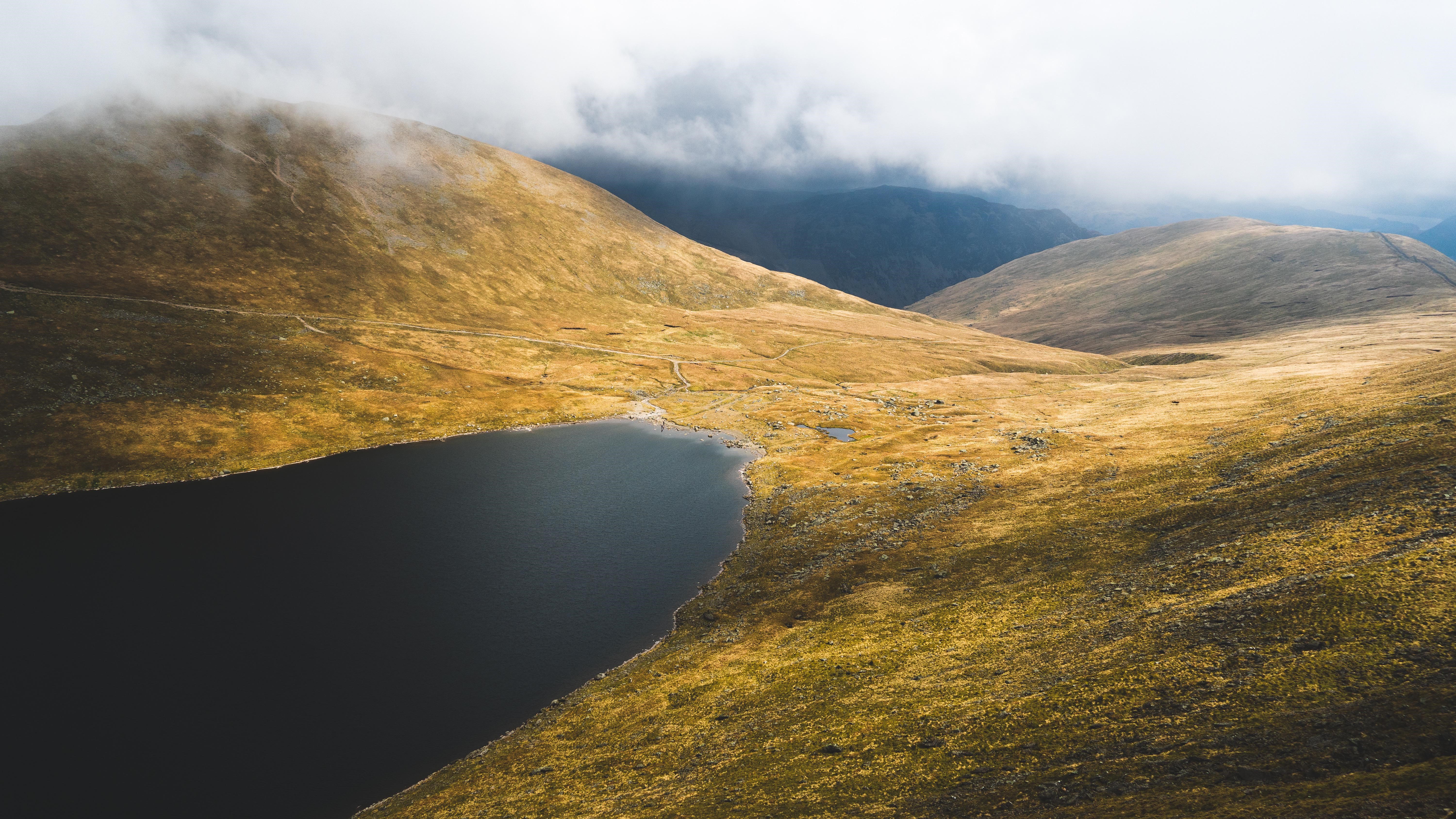 4K UK landscape with mountains, lake, and clouds HD Wallpaper