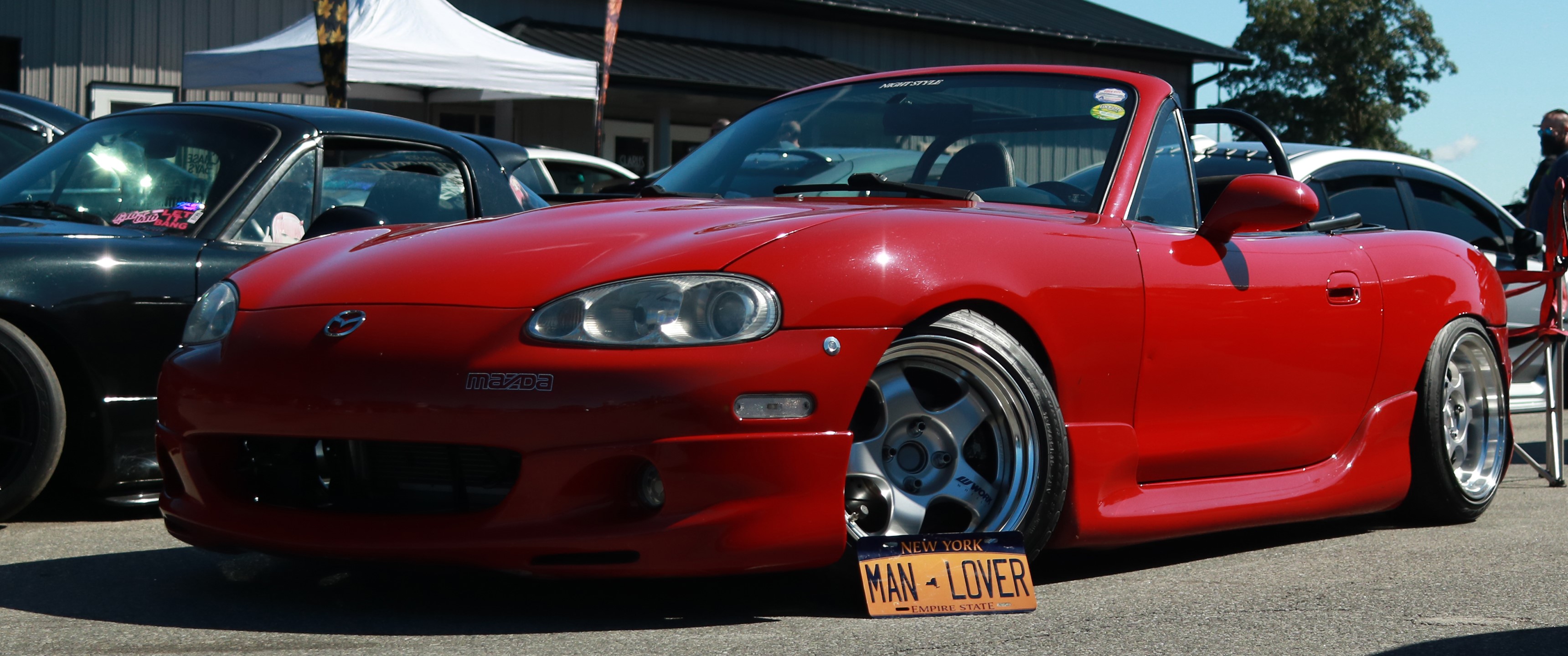 Red Mazda Miata convertible with custom wheels HD Wallpaper