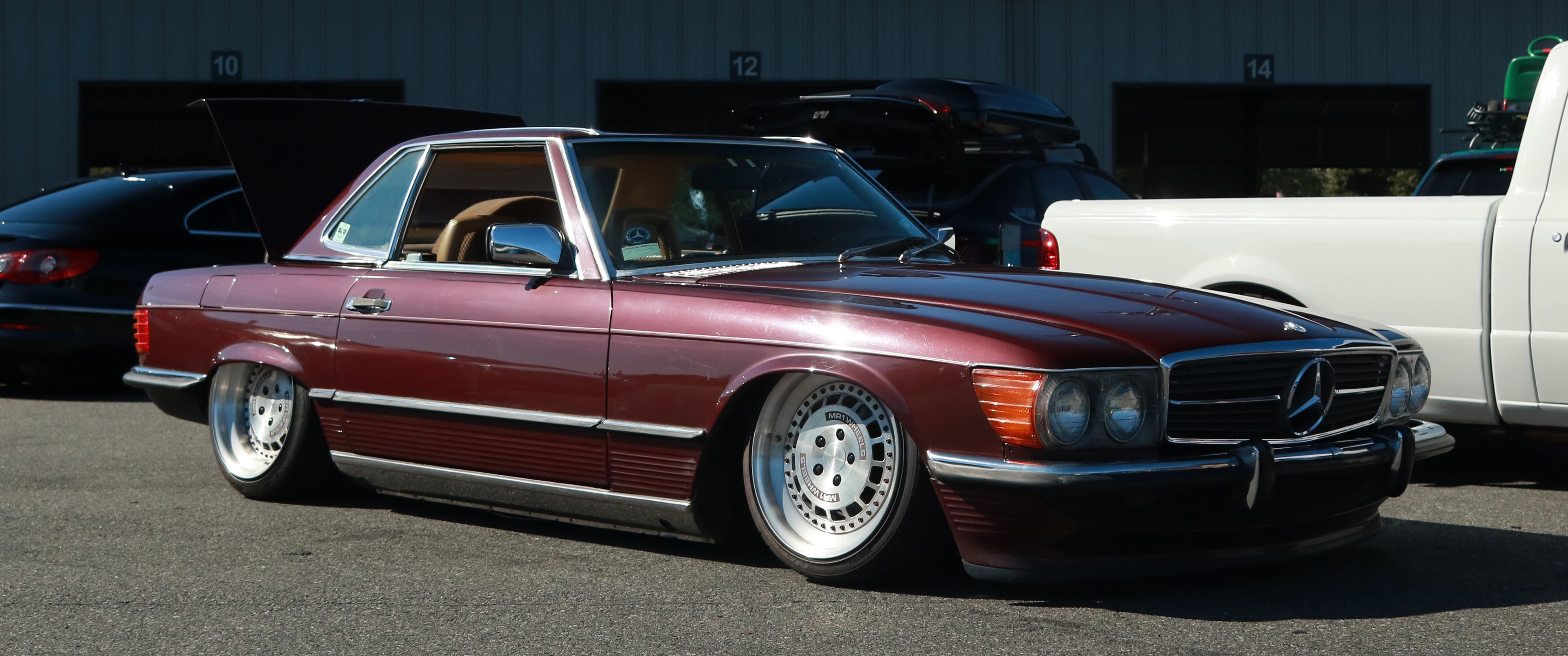 Maroon Mercedes-Benz SL with custom wheels HD Wallpaper
