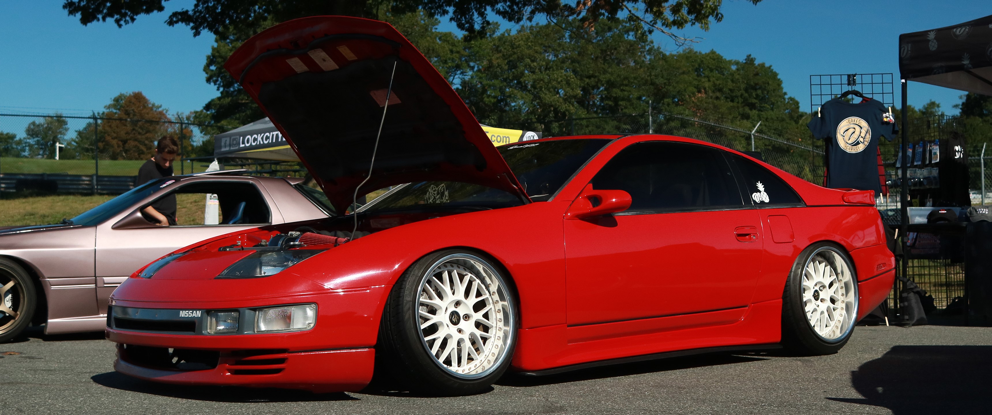 Red Nissan 300ZX with hood open at car show HD Wallpaper