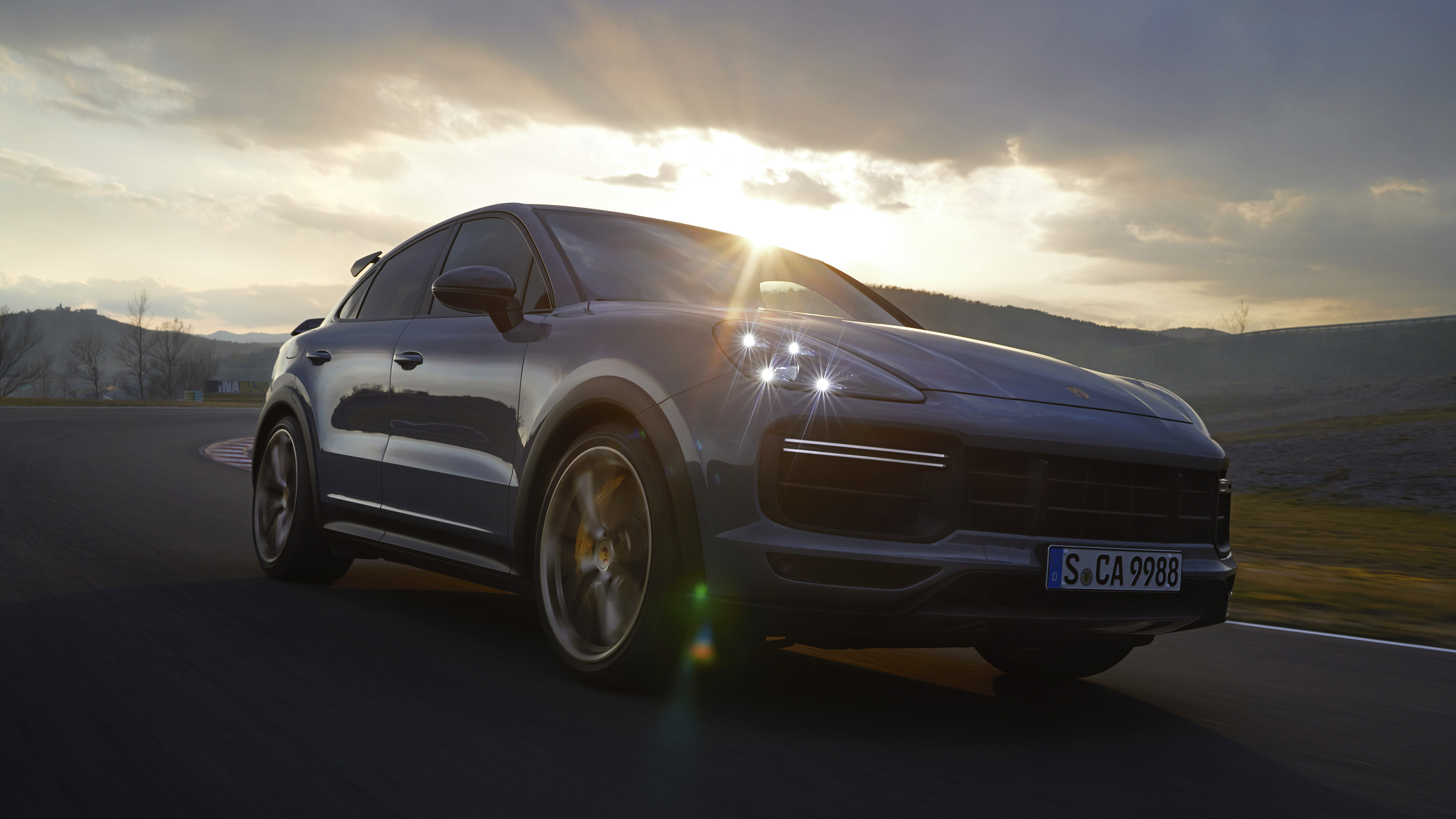 2022 Porsche Cayenne Turbo GT on a race track HD Wallpaper