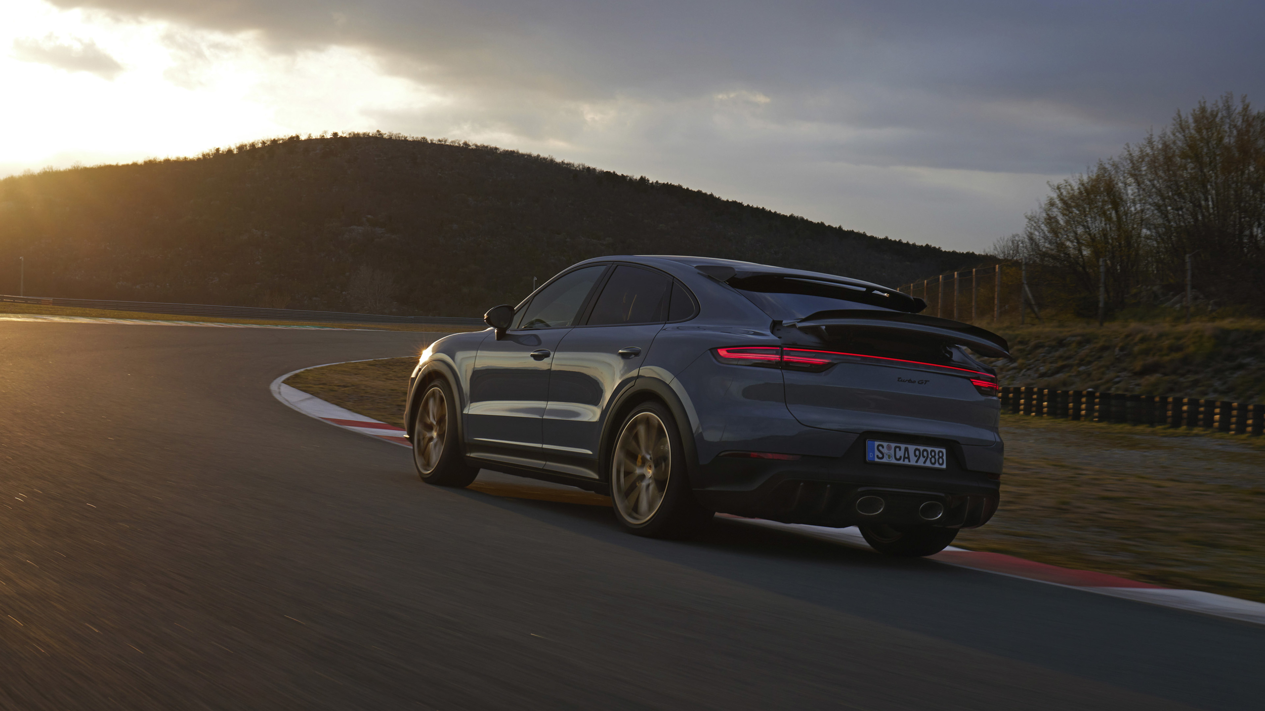 2022 Porsche Cayenne Turbo GT on a race track HD Wallpaper