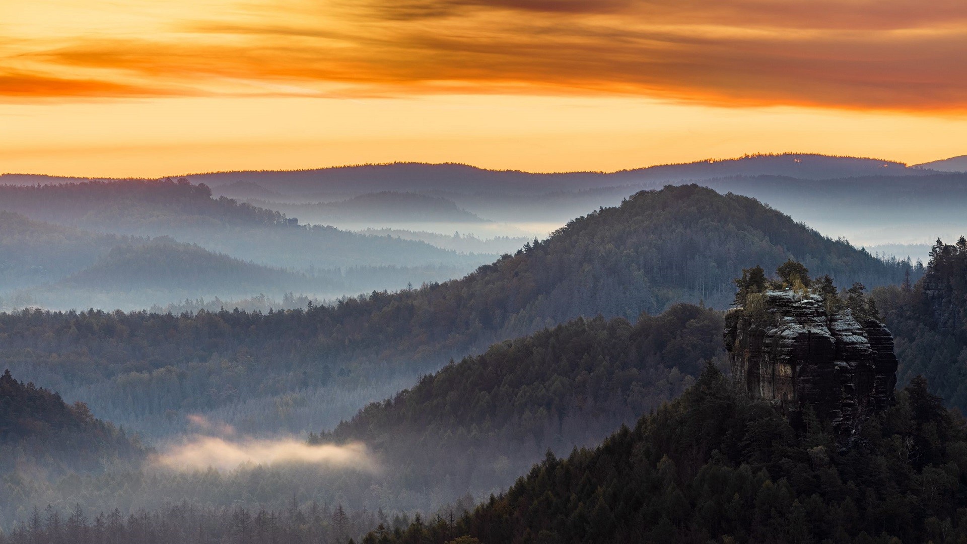 Misty mountain range at sunrise HD Wallpaper