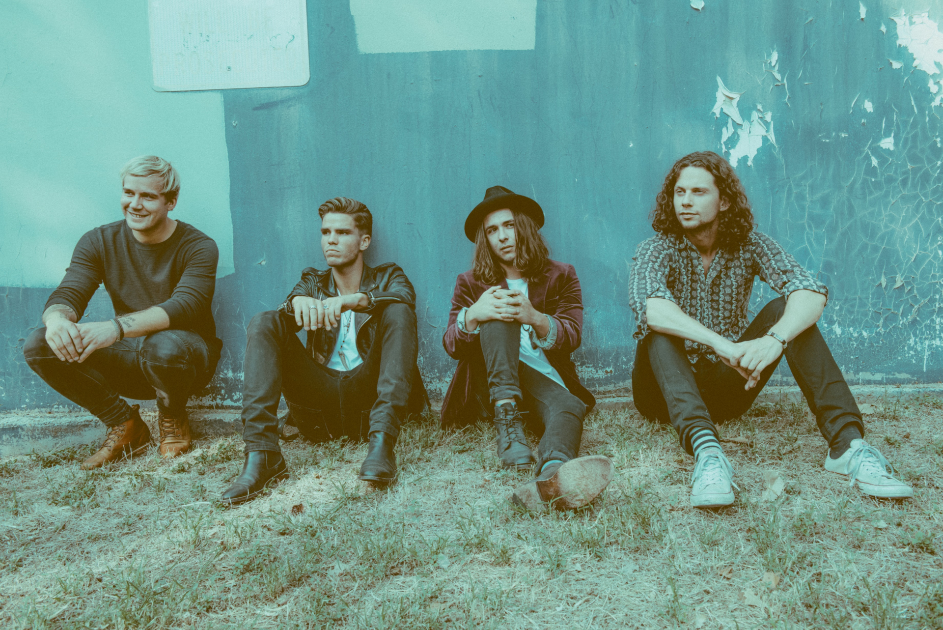 KALEO band sitting by a wall HD Wallpaper