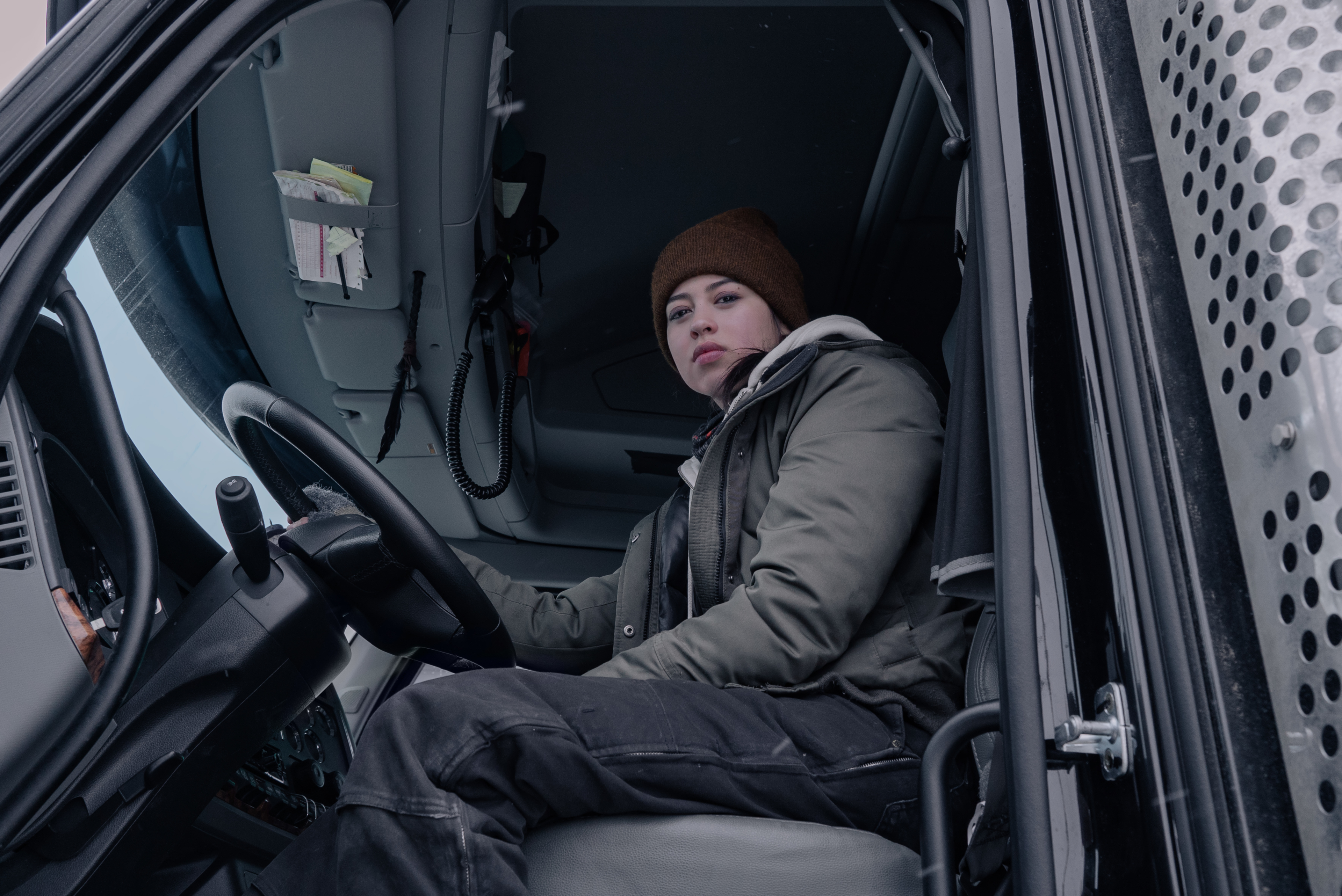 Amber Midthunder in a truck HD Wallpaper