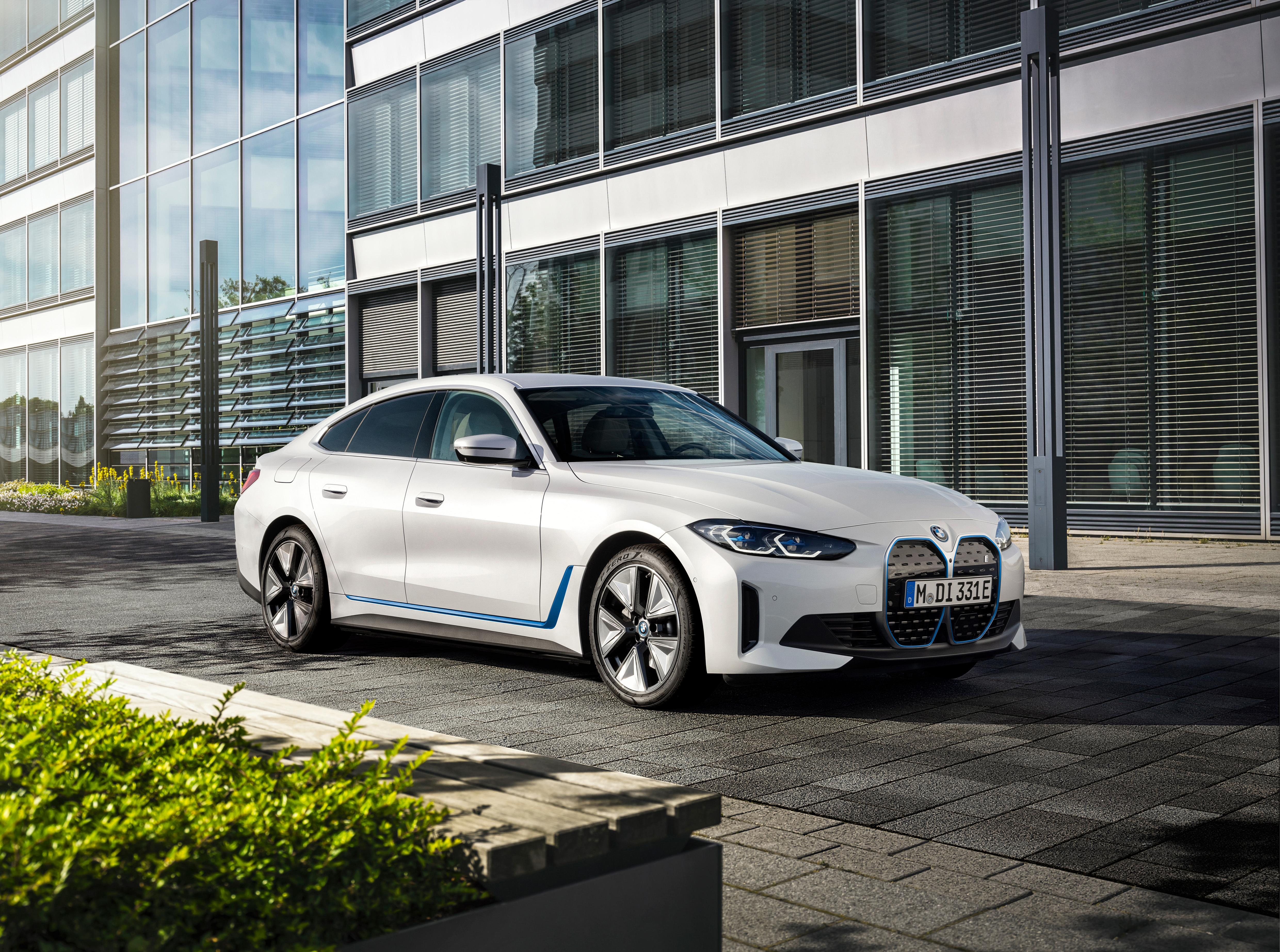 White BMW i4 Electric Car HD Wallpaper