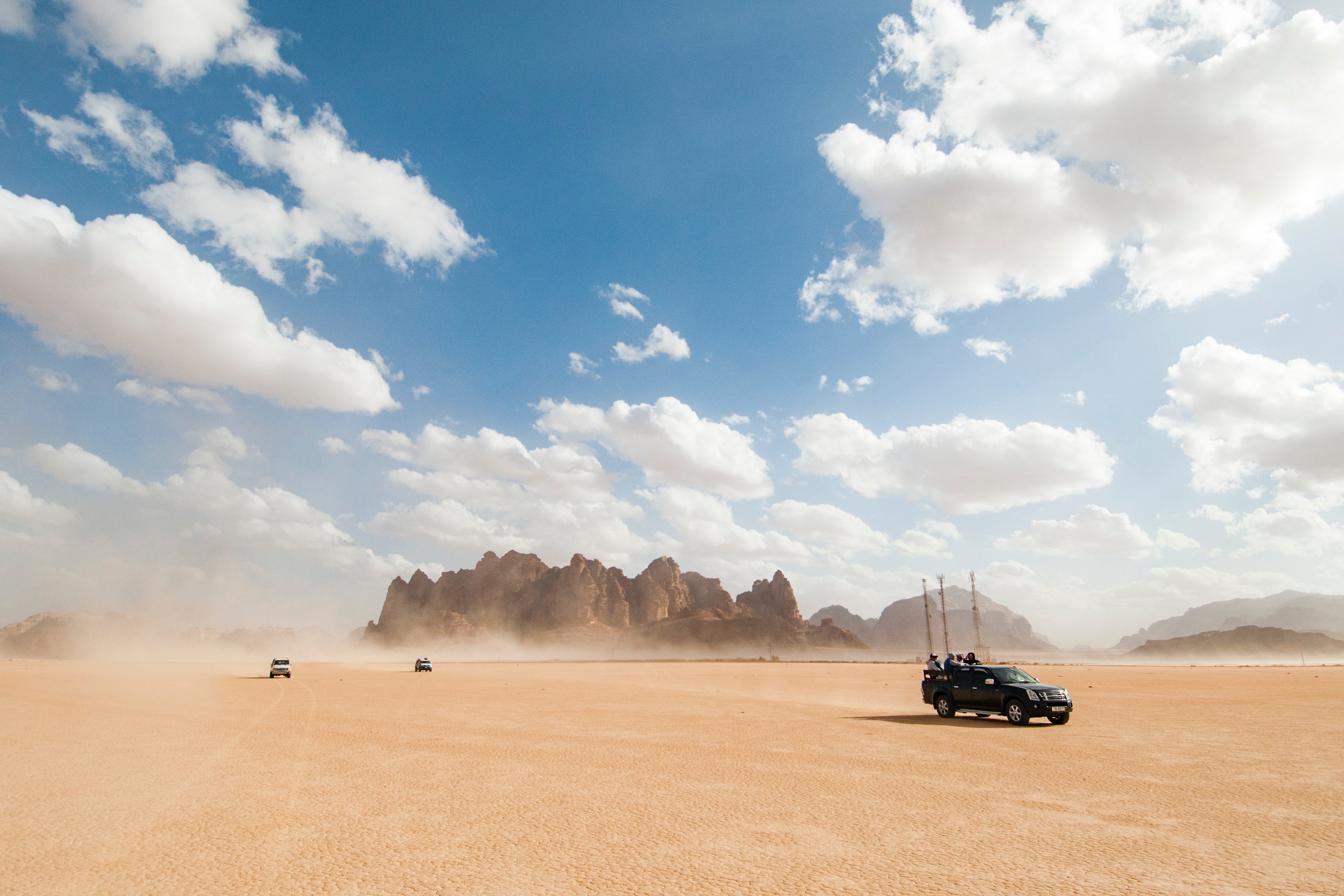 4K, rock formation, SUV, clouds, Wadi Rum HD Wallpaper
