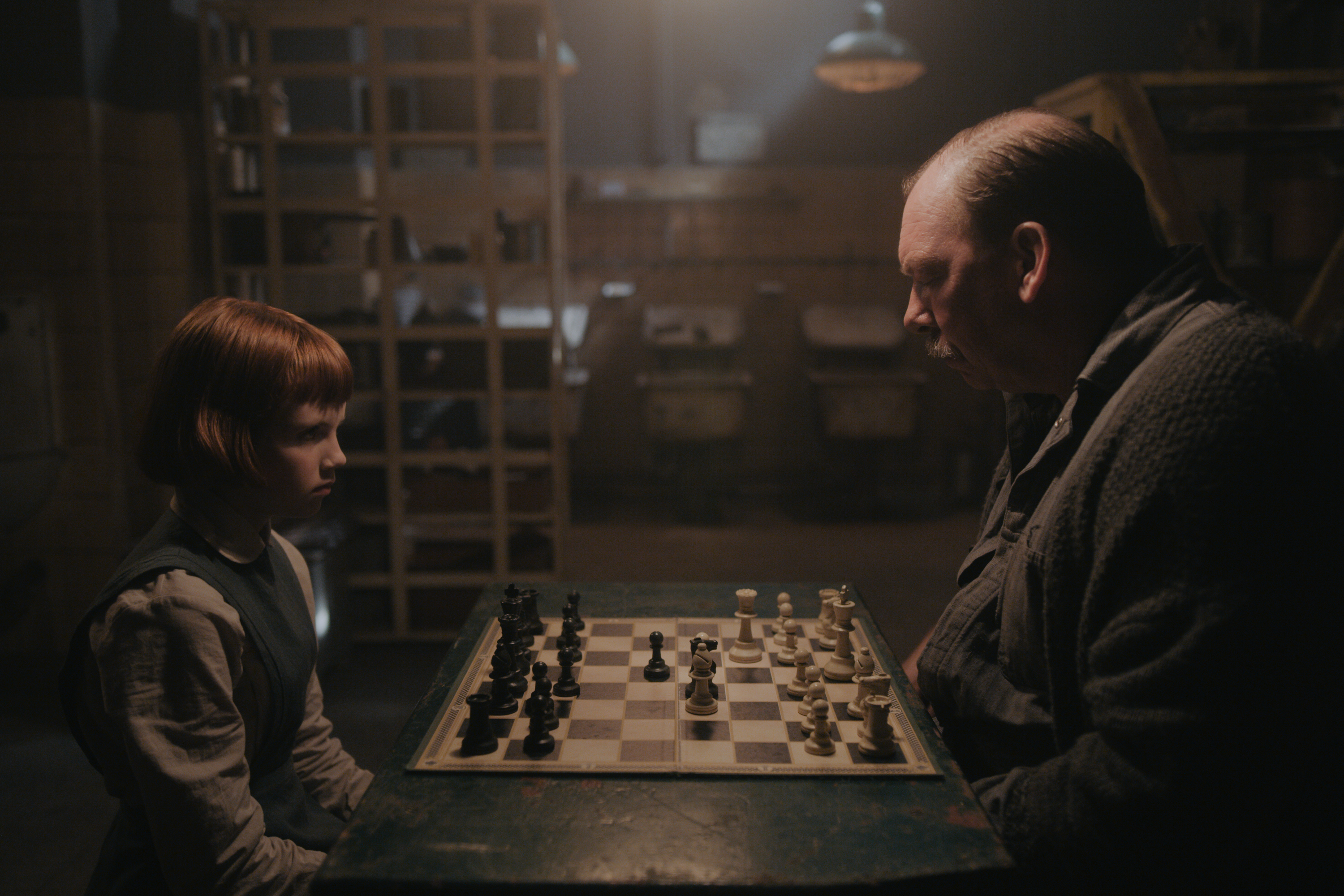 Beth Harmon and Mr. Shaibel play chess HD Wallpaper
