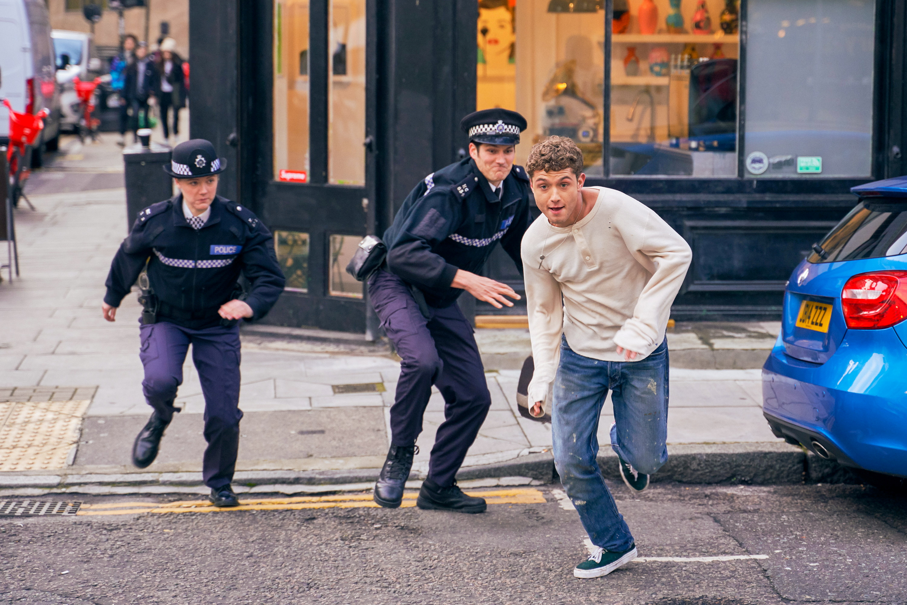 Raff Law chased by police officers HD Wallpaper