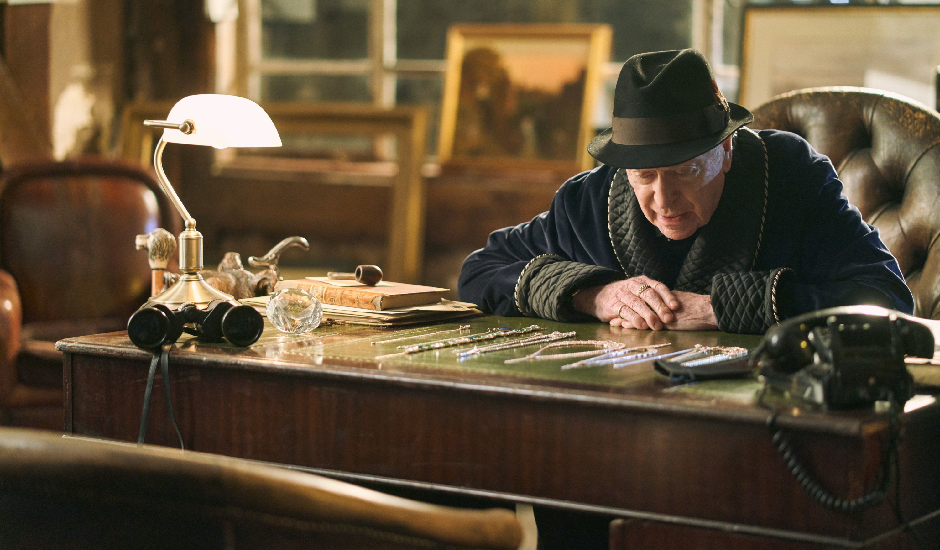 Michael Caine in a Robe and Hat HD Wallpaper