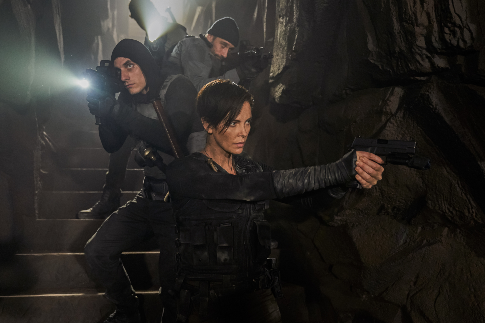 The Old Guard action scene with Charlize Theron HD Wallpaper