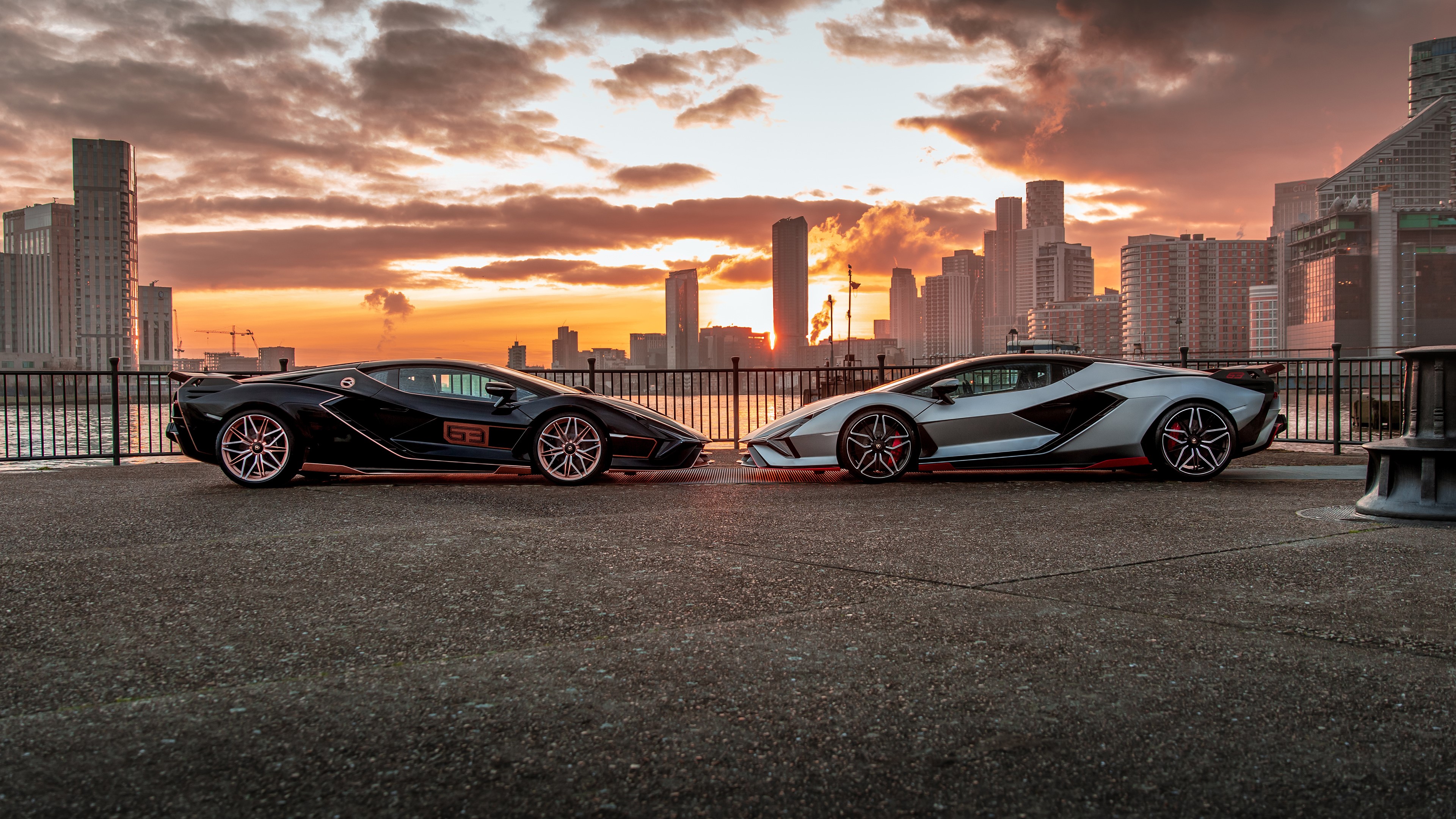 4K, electric car, Italian Supercars, silver cars, city, outdoors, black cars, Hybrid, Lamborghini, car, vehicle, supercars, Lamborghini Sian, sunset, clouds, skyscraper HD Wallpaper