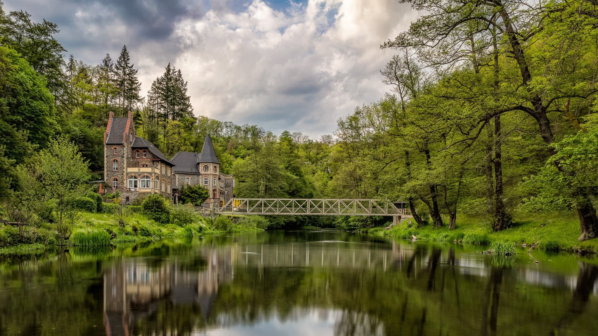 Hotel Bodeblick in Treseburg, Germany with river and bridge HD Wallpaper