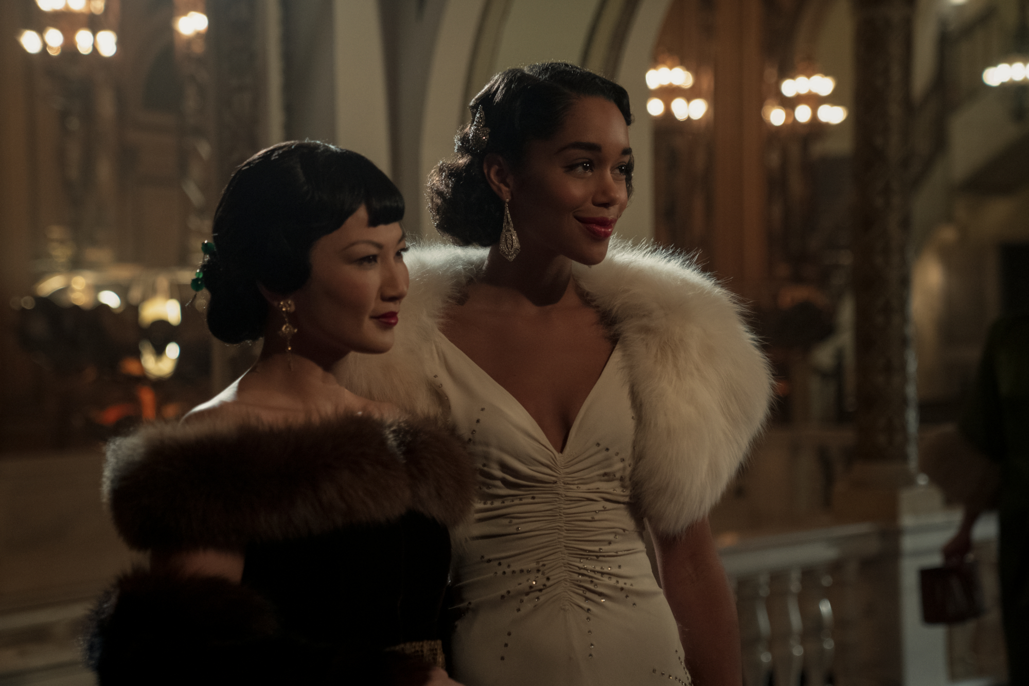 Laura Harrier and Camille Washington in elegant gowns HD Wallpaper