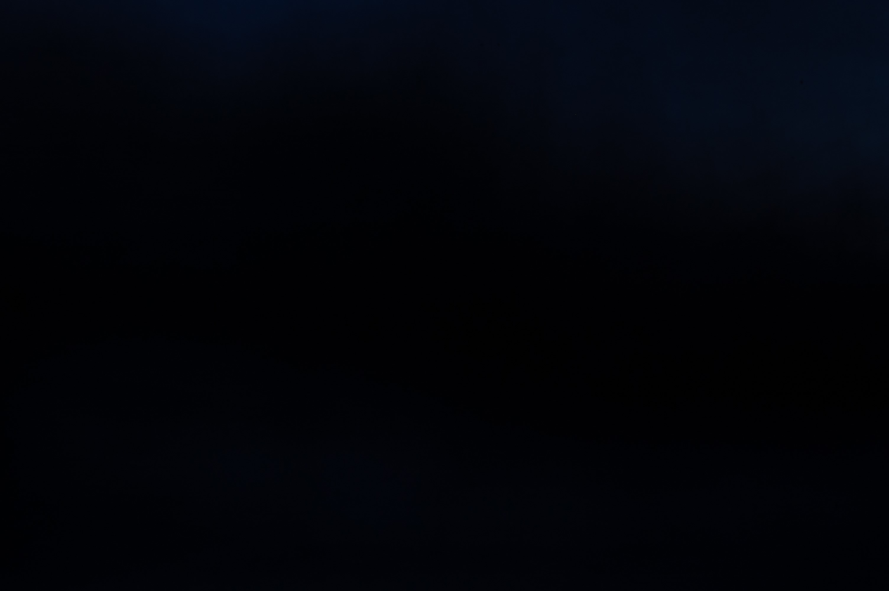Abstract dark texture with subtle blue and white highlights HD Wallpaper