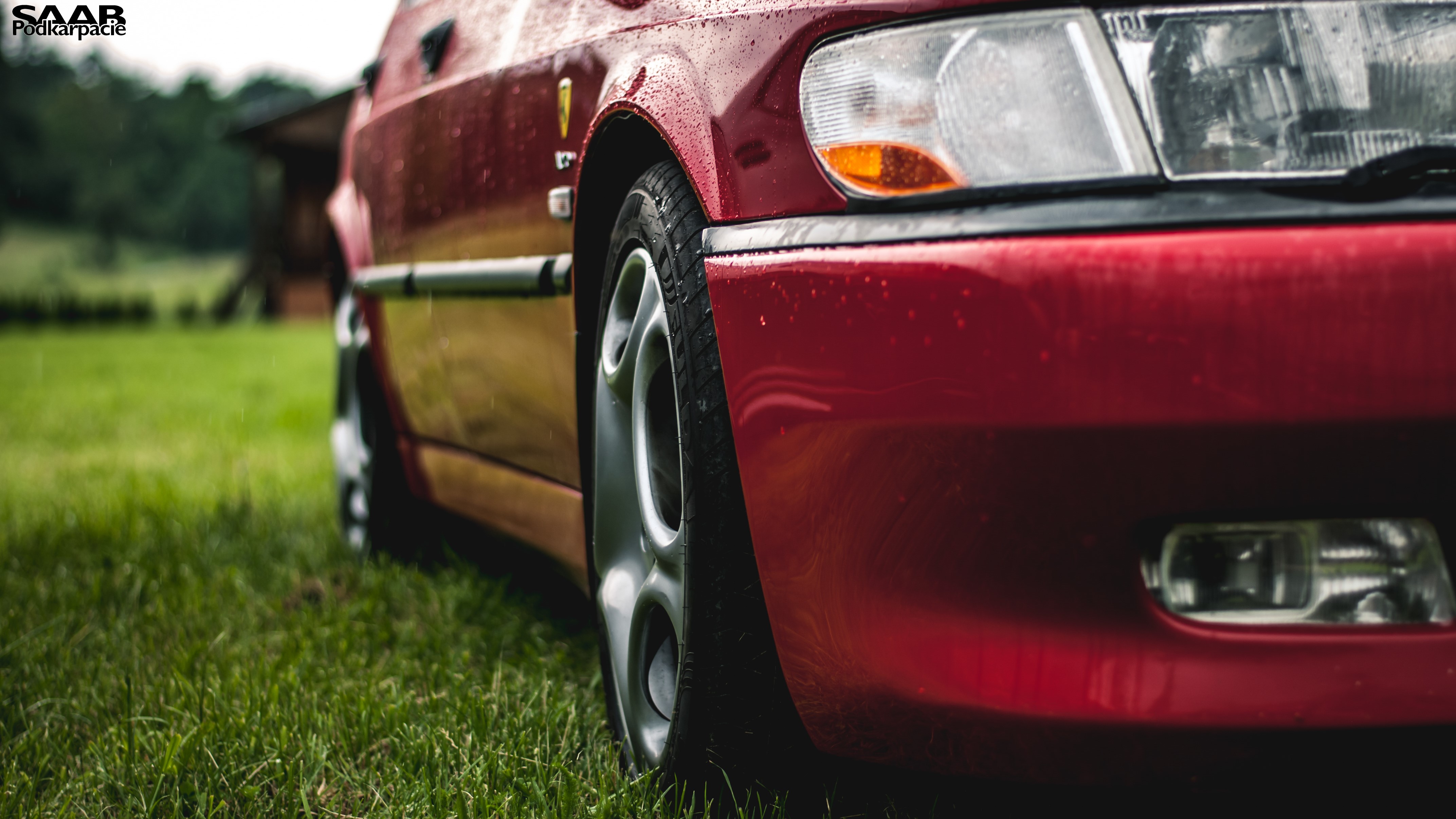 Red Saab 9-3 in the rain in Podkarpacie HD Wallpaper