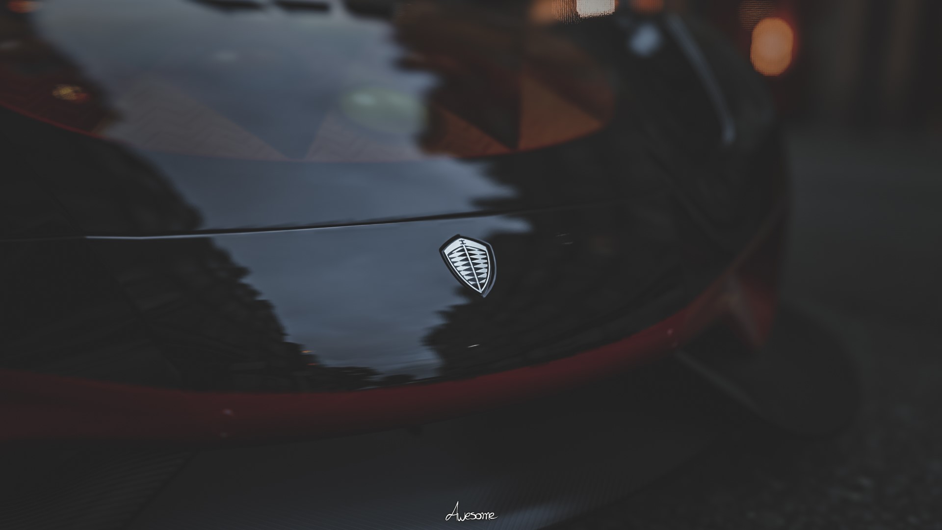 Koenigsegg Regera emblem on a black car HD Wallpaper