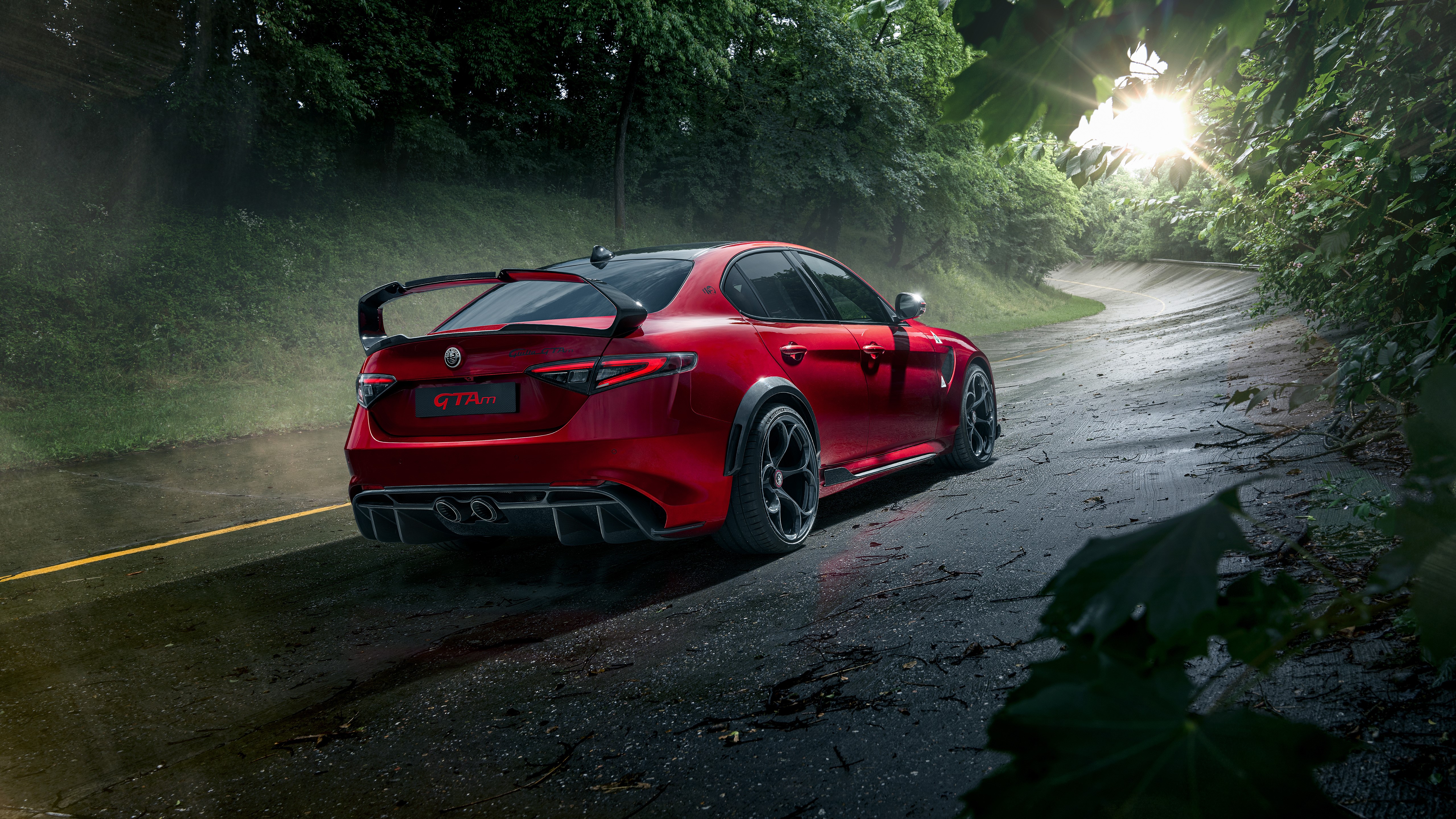 4K Red Alfa Romeo Giulia GTA on a Forest Road HD Wallpaper