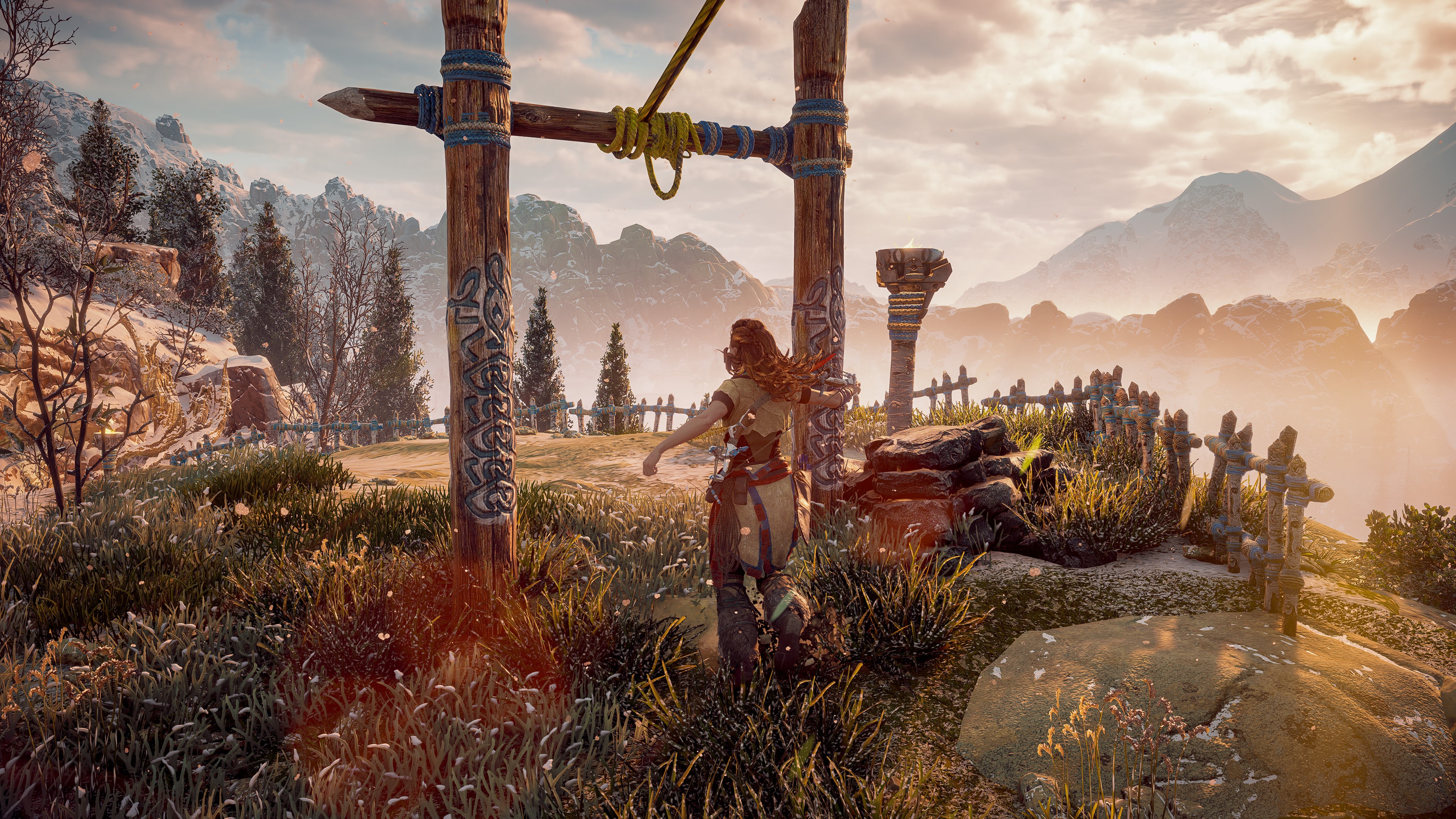 Aloy from Horizon Zero Dawn in a mountainous landscape HD Wallpaper