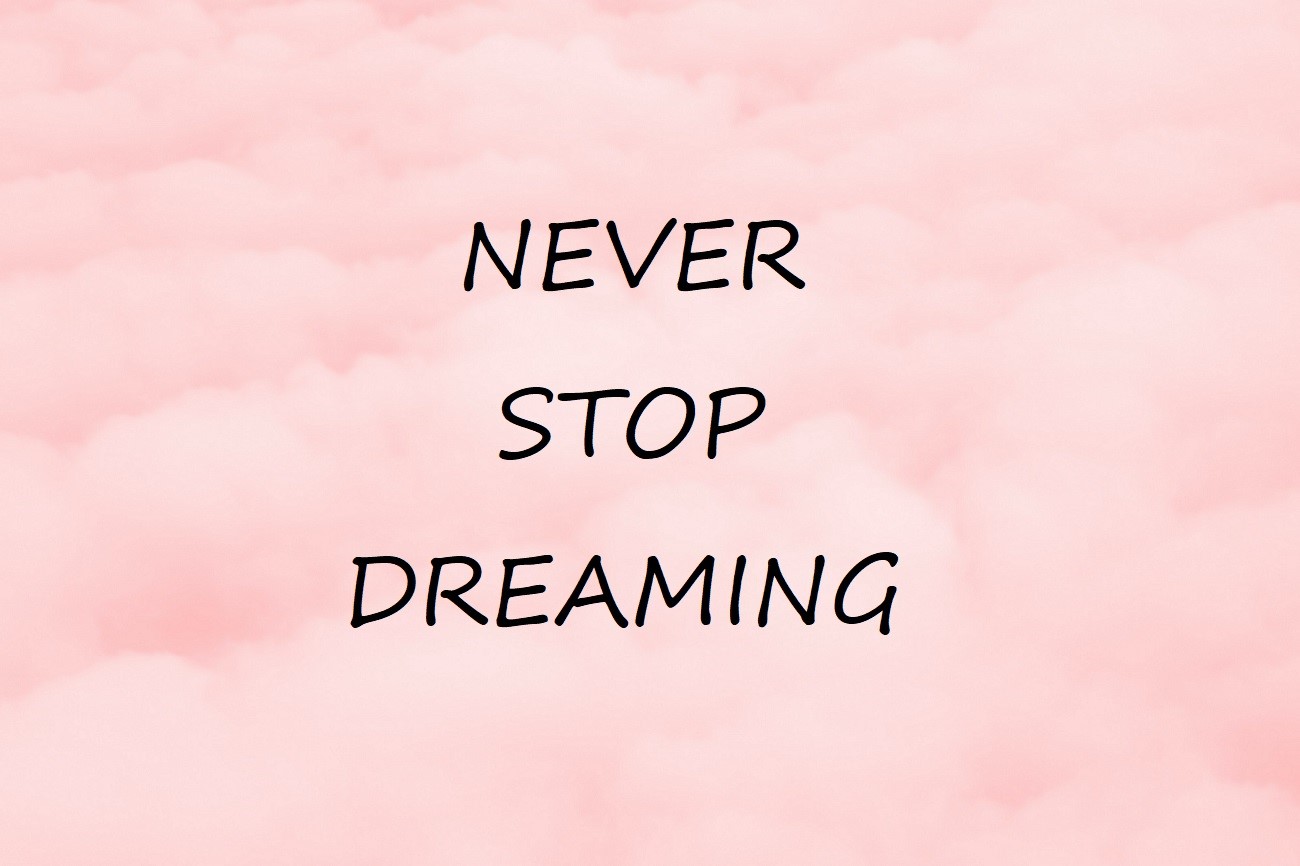Never Stop Dreaming motivational quote HD Wallpaper