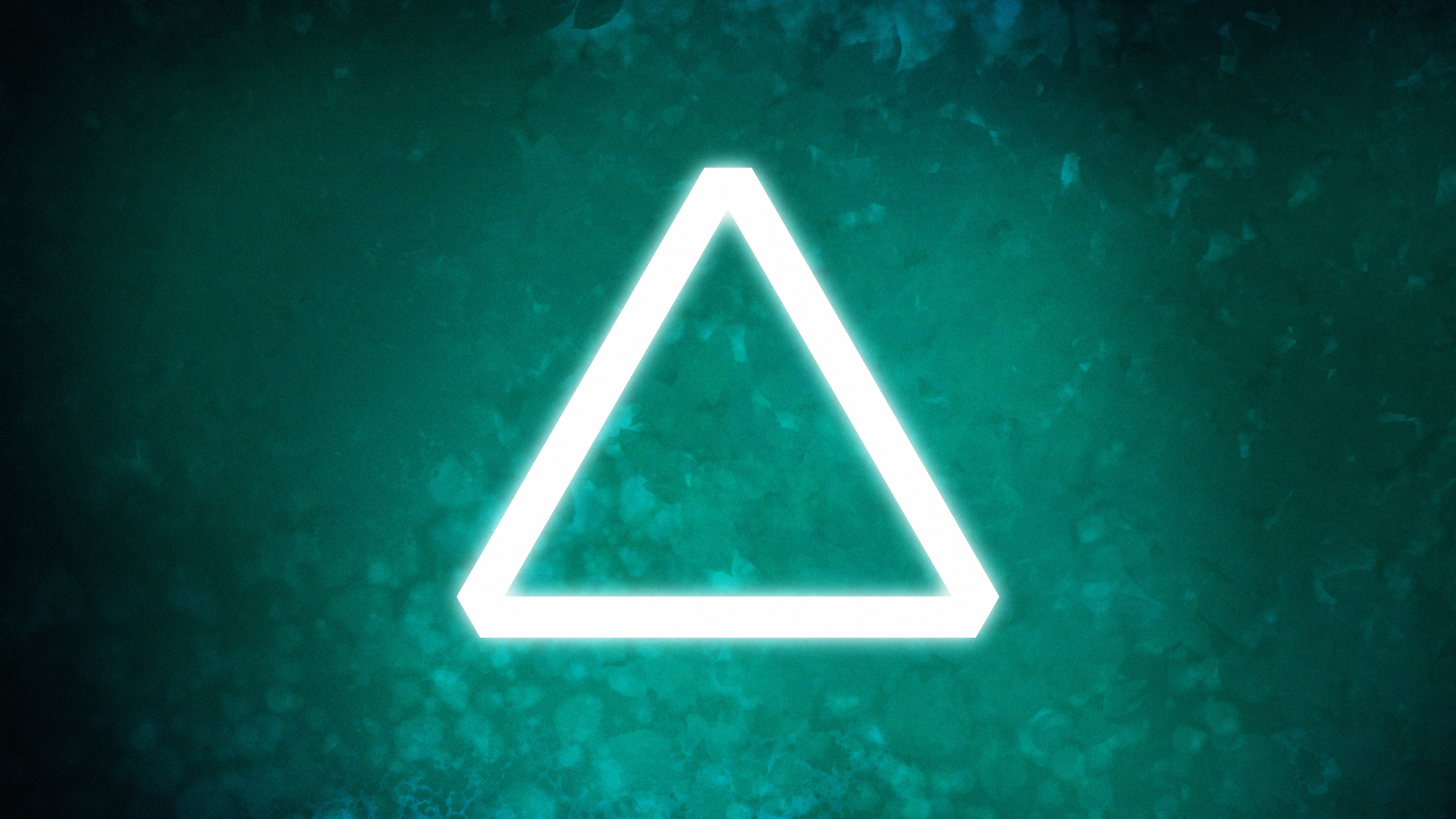 Glowing triangle on a textured green background HD Wallpaper
