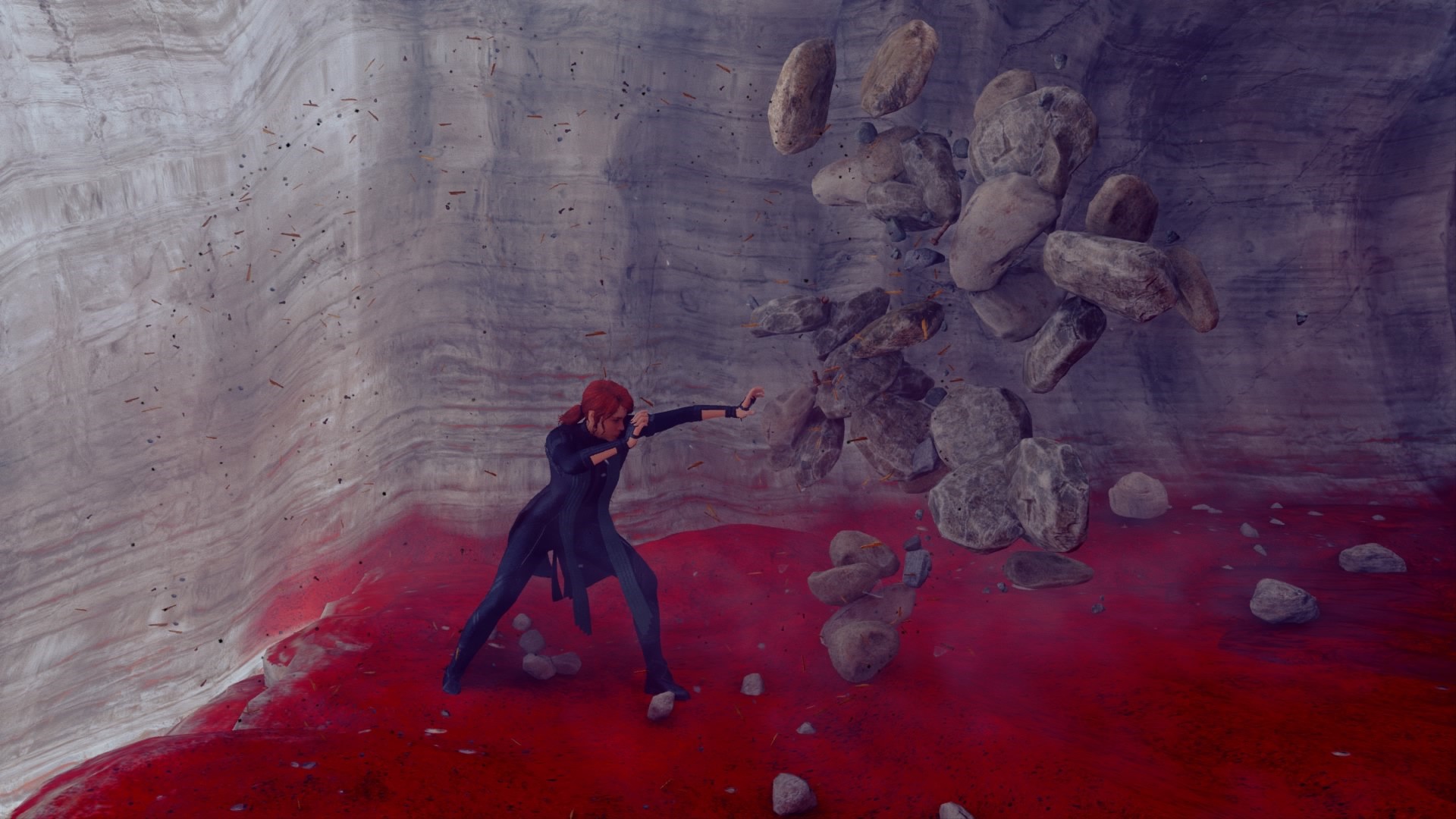 Jesse Faden from Control levitates rocks in a cave HD Wallpaper