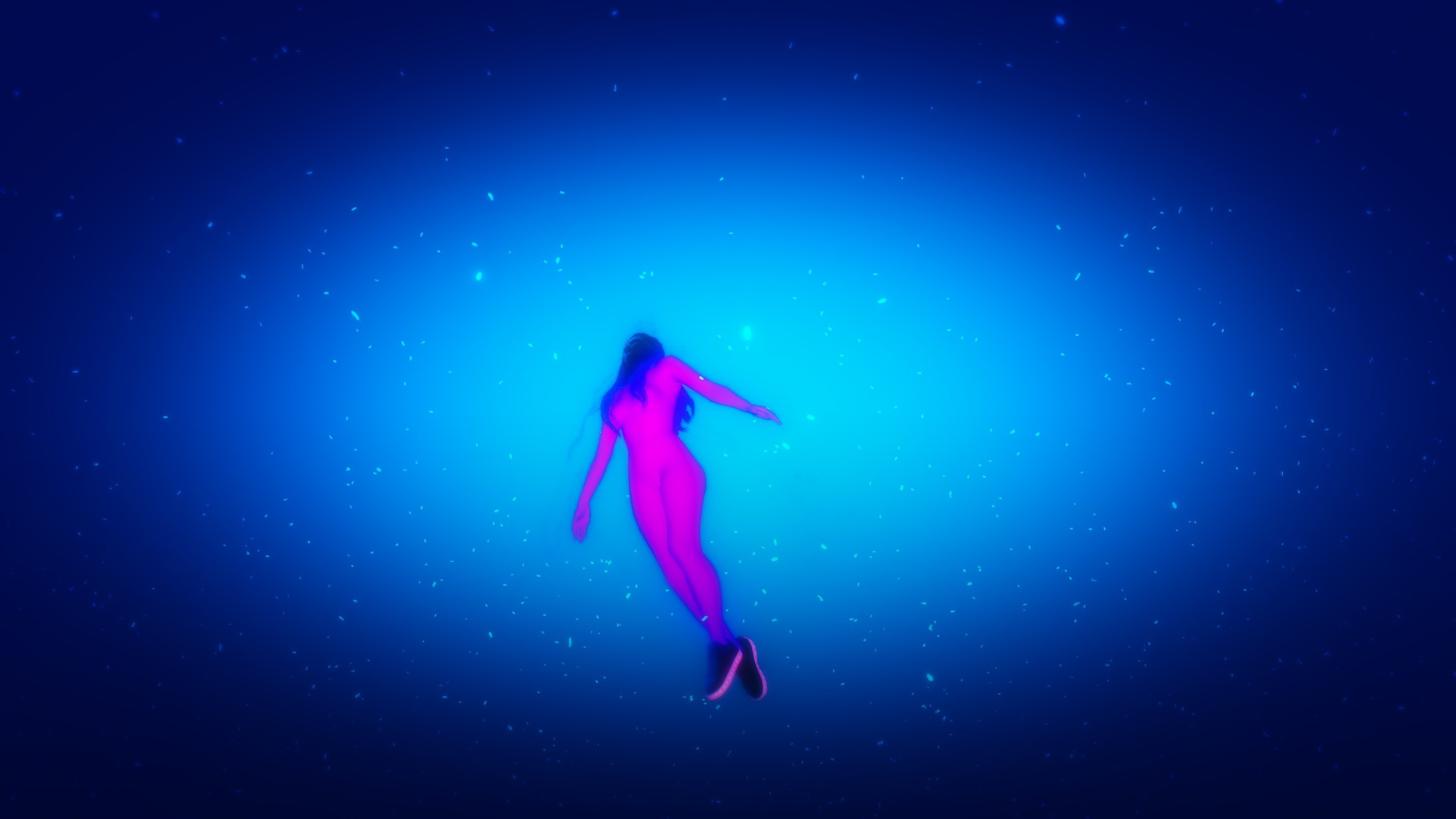 Woman floating in a starry blue void HD Wallpaper