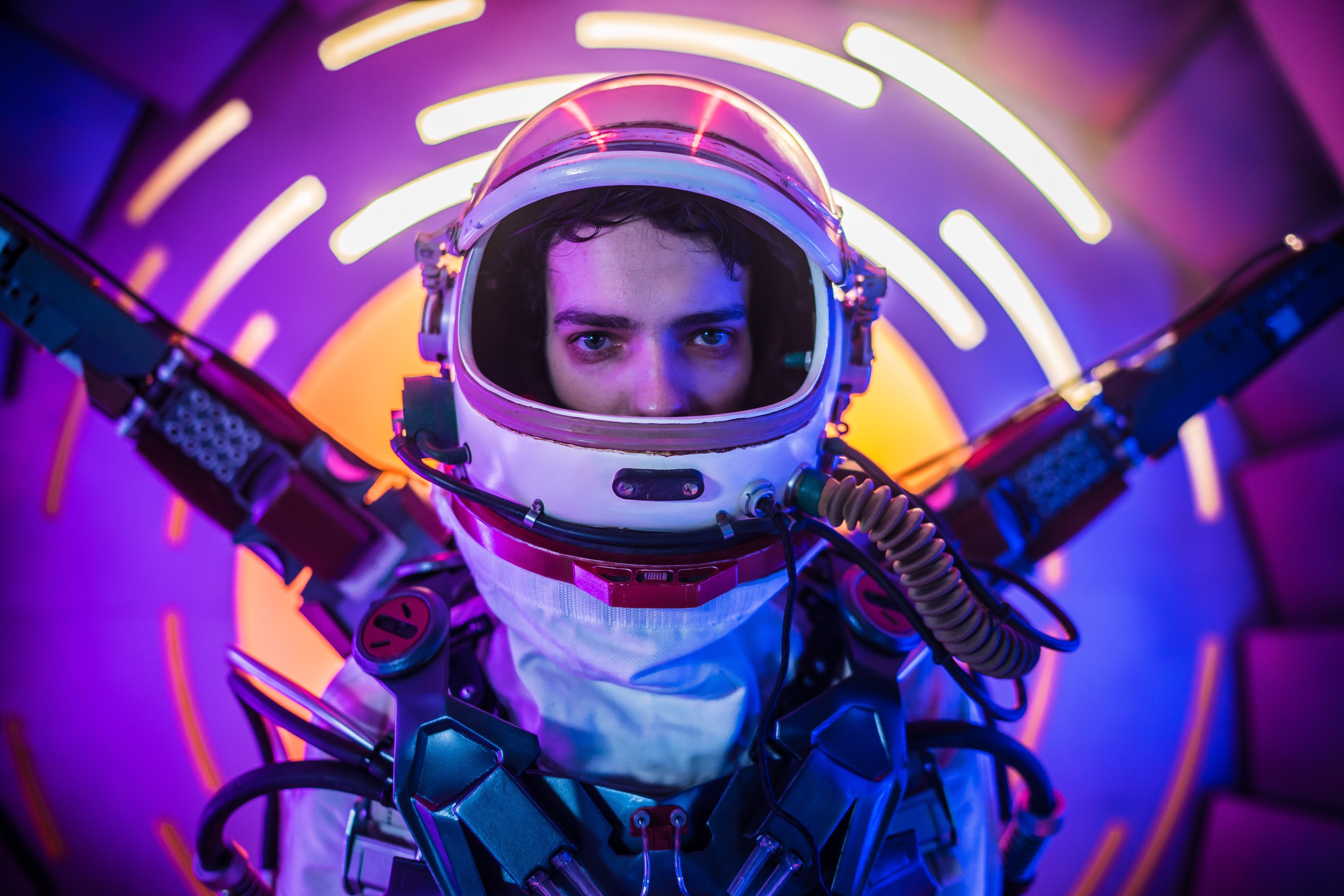 Kodi Smit-McPhee in a futuristic astronaut suit HD Wallpaper