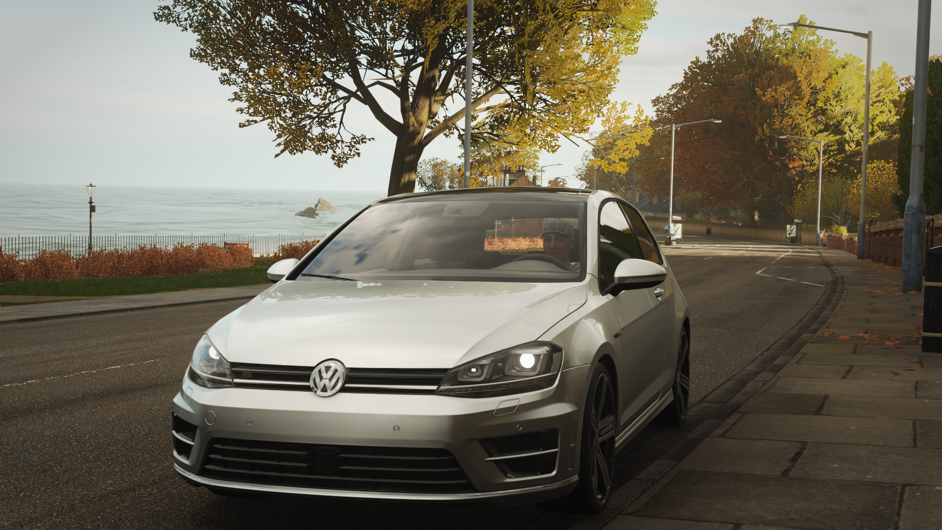 Volkswagen Golf mk7 driving on a coastal road in Forza Horizon 4 HD Wallpaper
