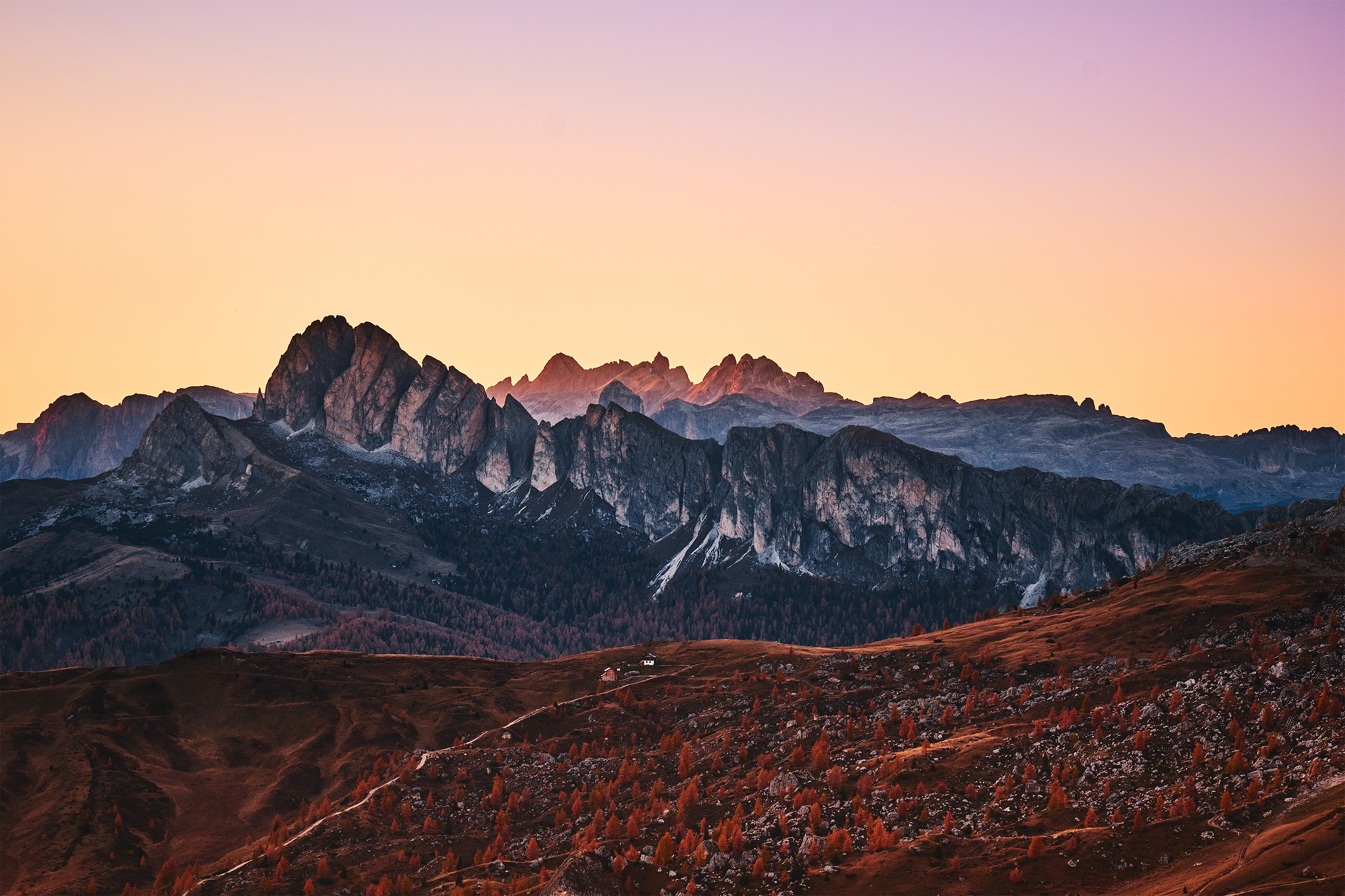 Mountain range at sunset in the Dolomites, Italy HD Wallpaper