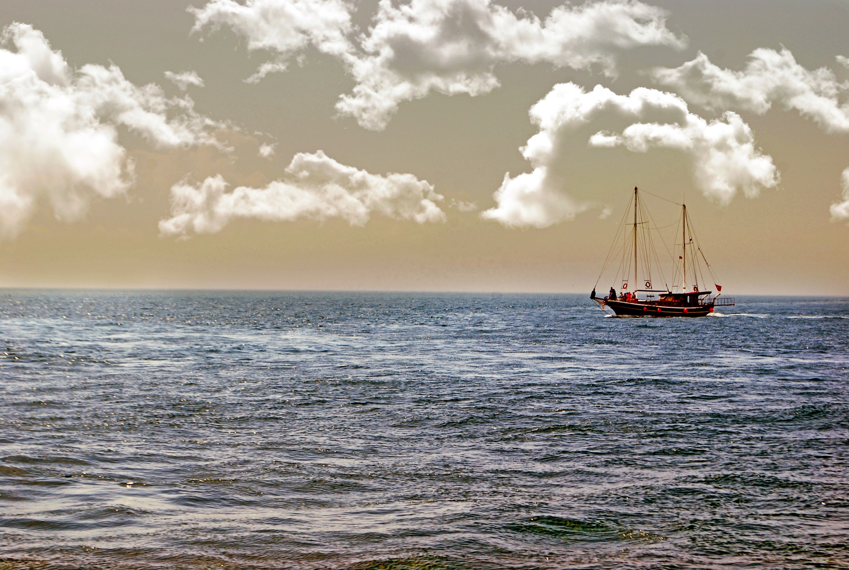 Sailboat on the sea with clouds HD Wallpaper