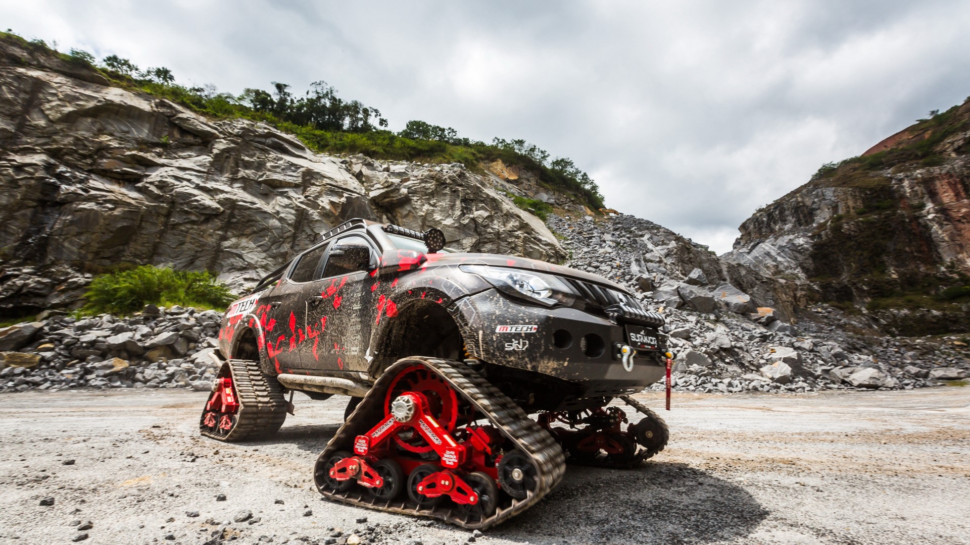 Mitsubishi Triton Survivor with tracks in quarry HD Wallpaper
