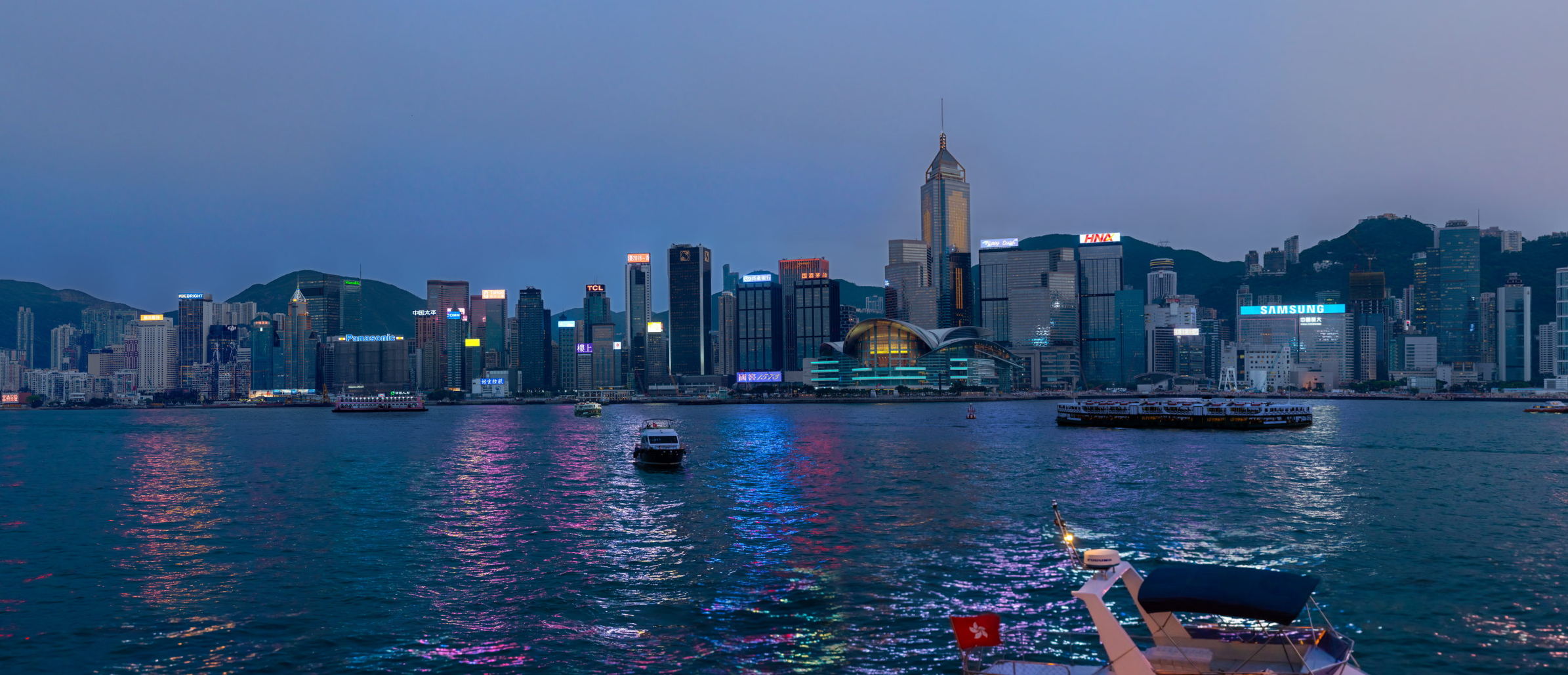 Hong Kong cityscape at dusk with Victoria Harbour HD Wallpaper