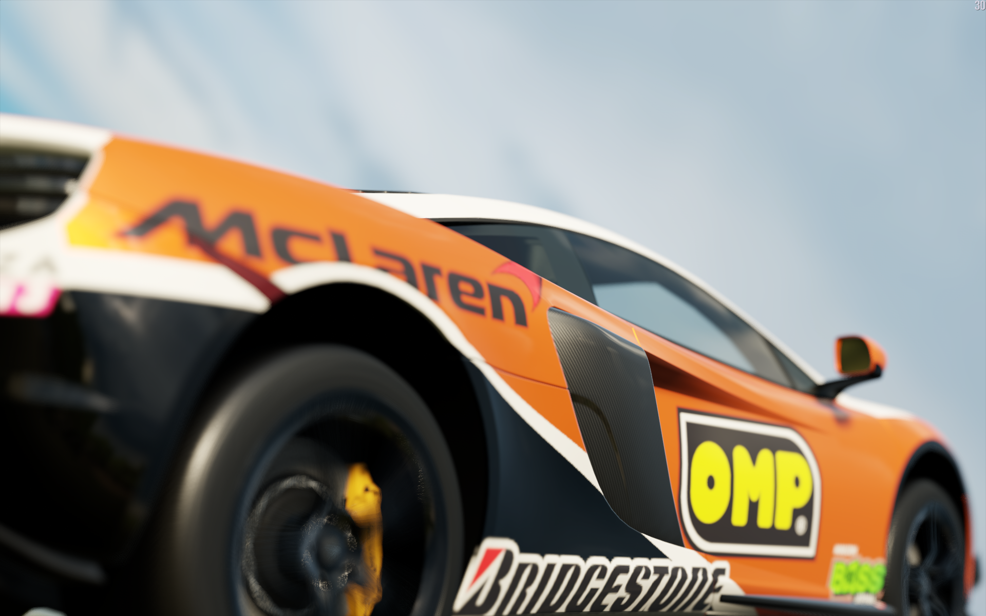 McLaren race car with OMP and Bridgestone logos HD Wallpaper
