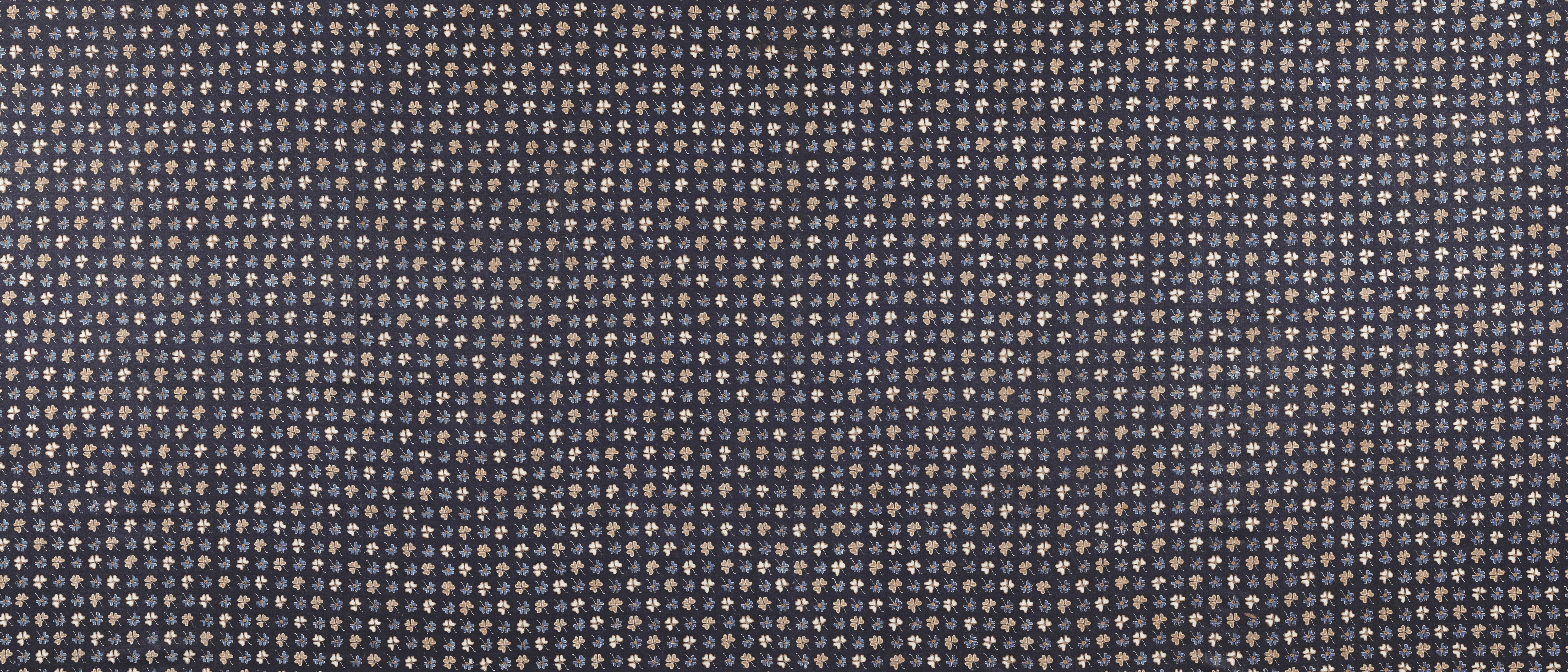 Dark fabric with a repeating small floral pattern HD Wallpaper