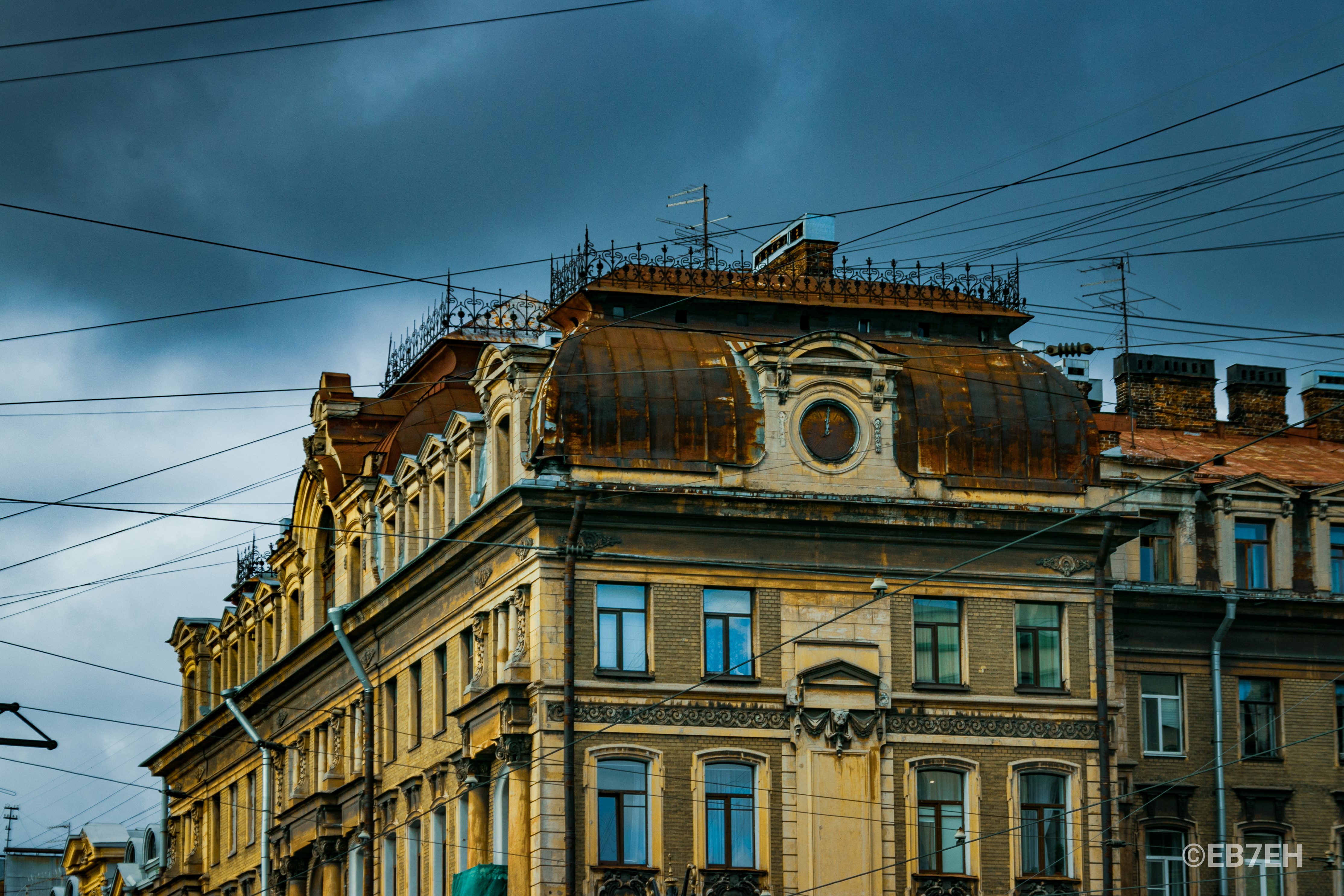 Old building with rusty roof and wires HD Wallpaper
