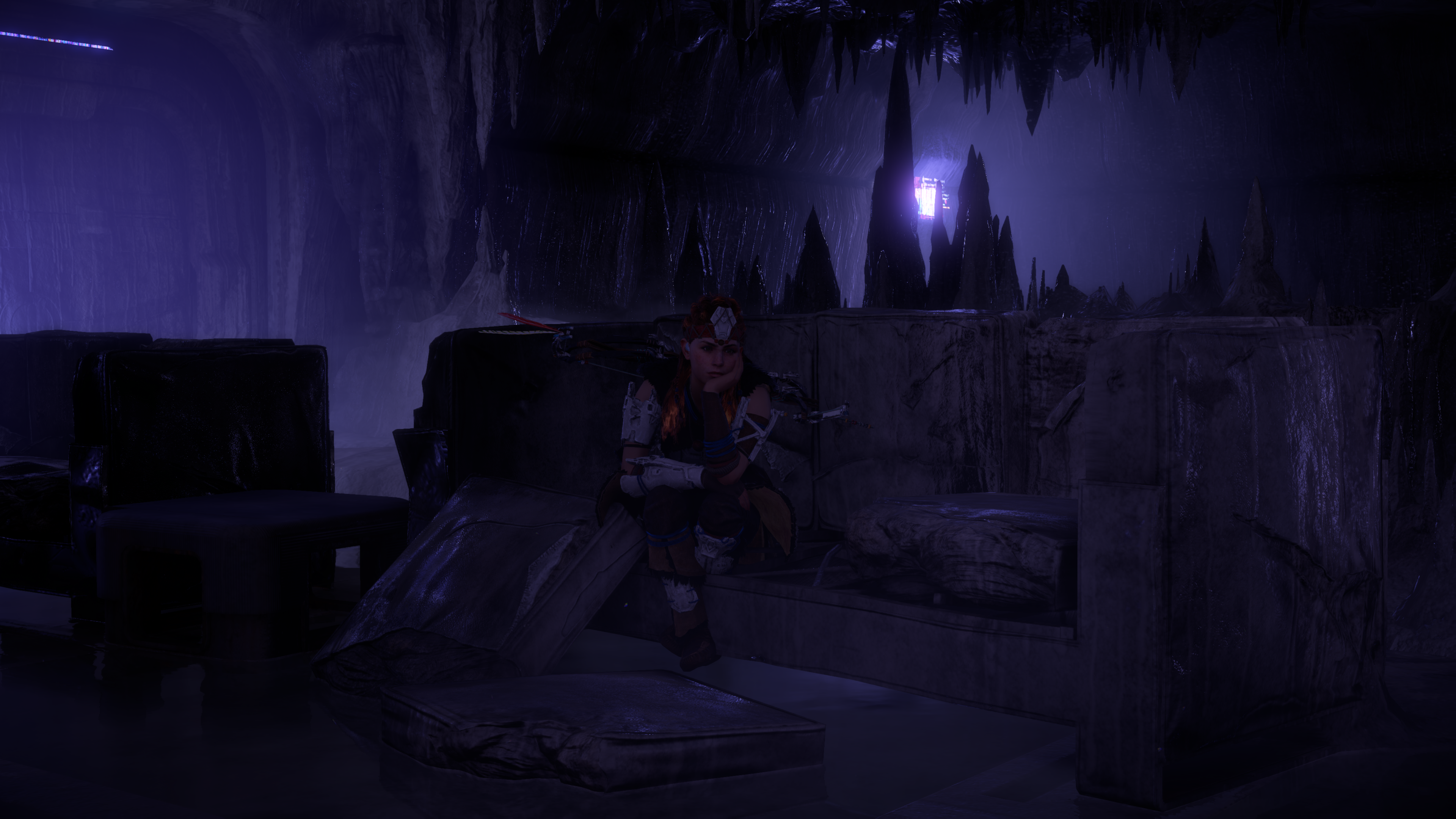 Aloy from Horizon Zero Dawn sitting in a cave HD Wallpaper