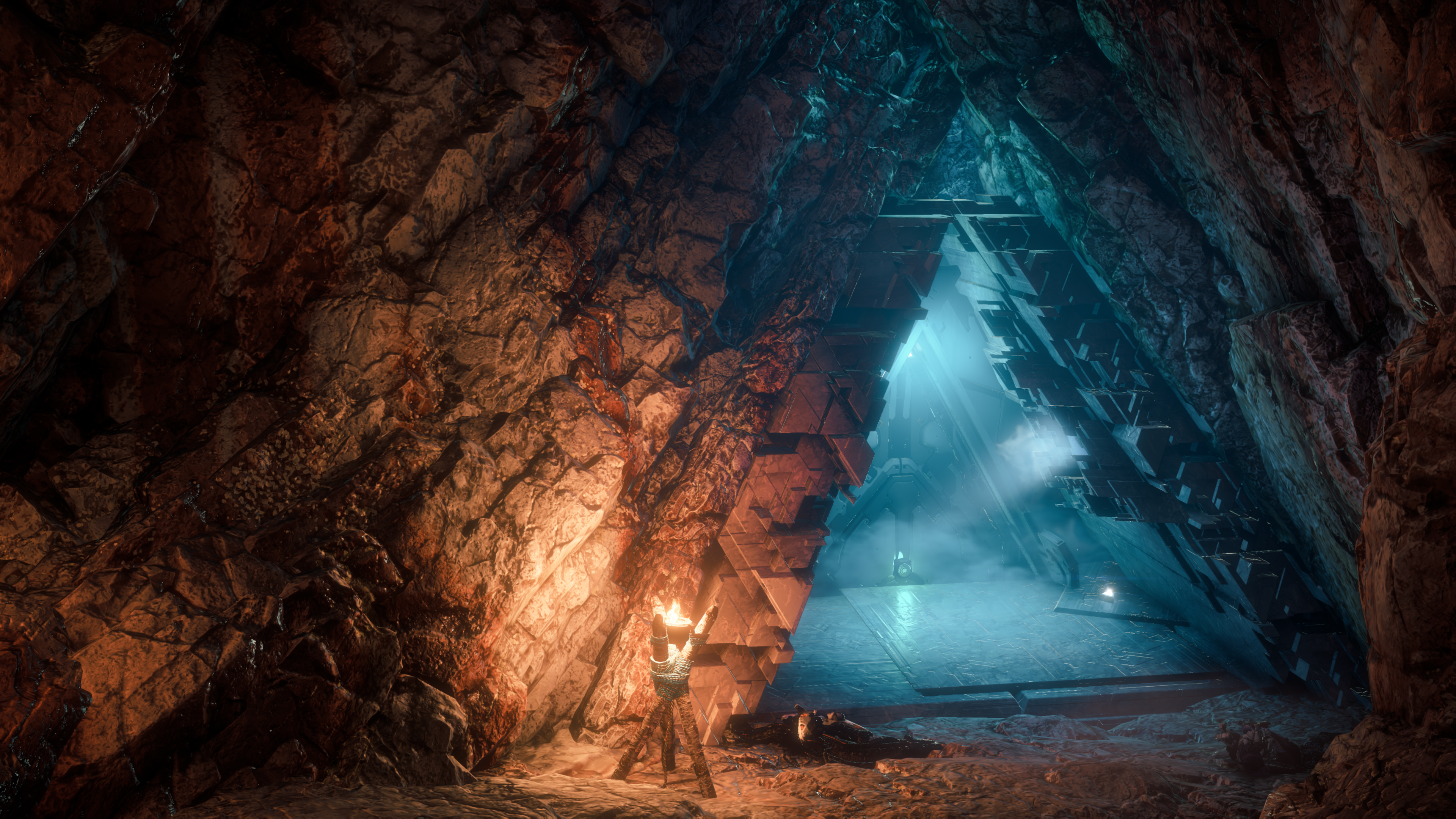 Cave entrance with futuristic structure in Horizon Zero Dawn HD Wallpaper
