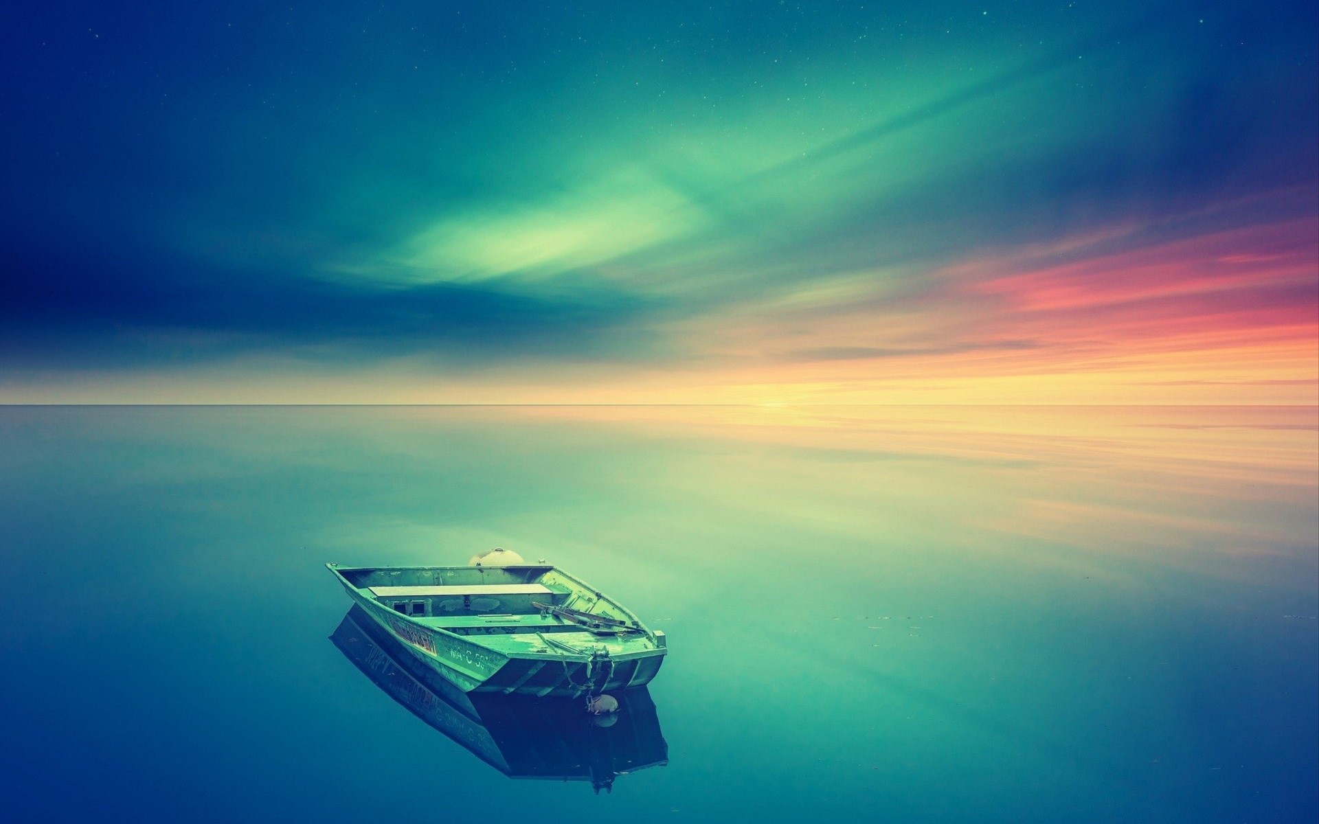Boat on calm water at sunset with stars HD Wallpaper