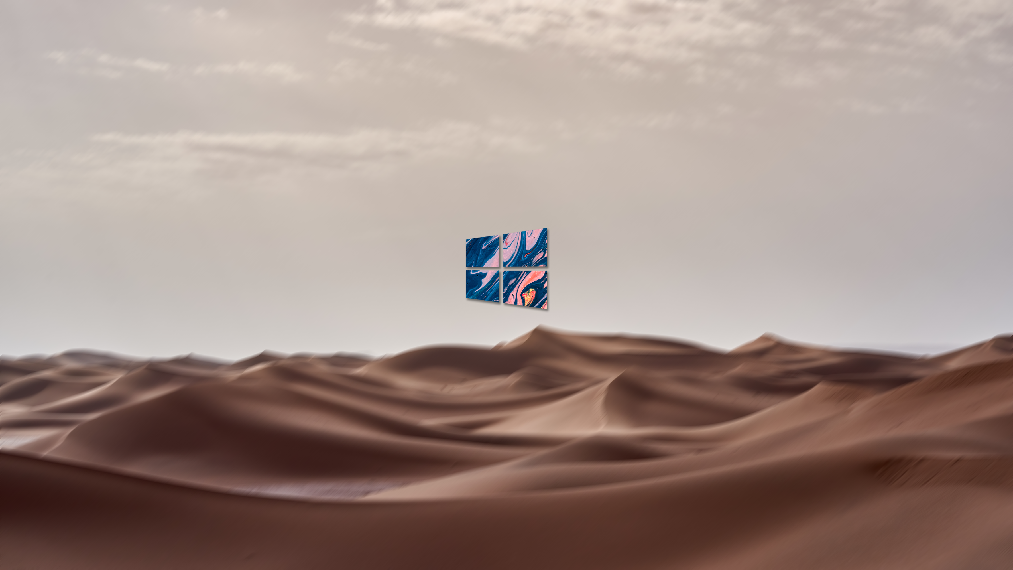 Windows 10 logo over desert dunes HD Wallpaper