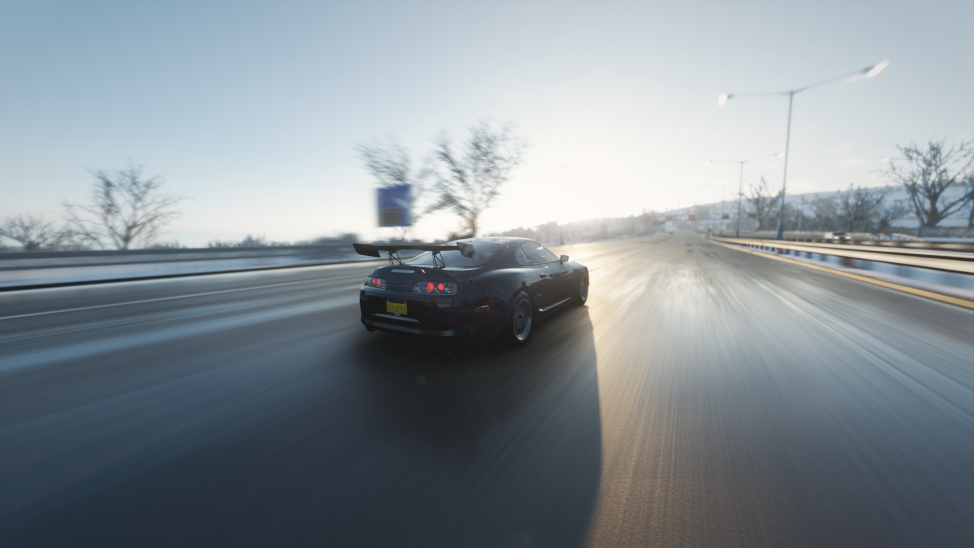 Toyota Supra driving on a snowy road in Forza Horizon 4 HD Wallpaper
