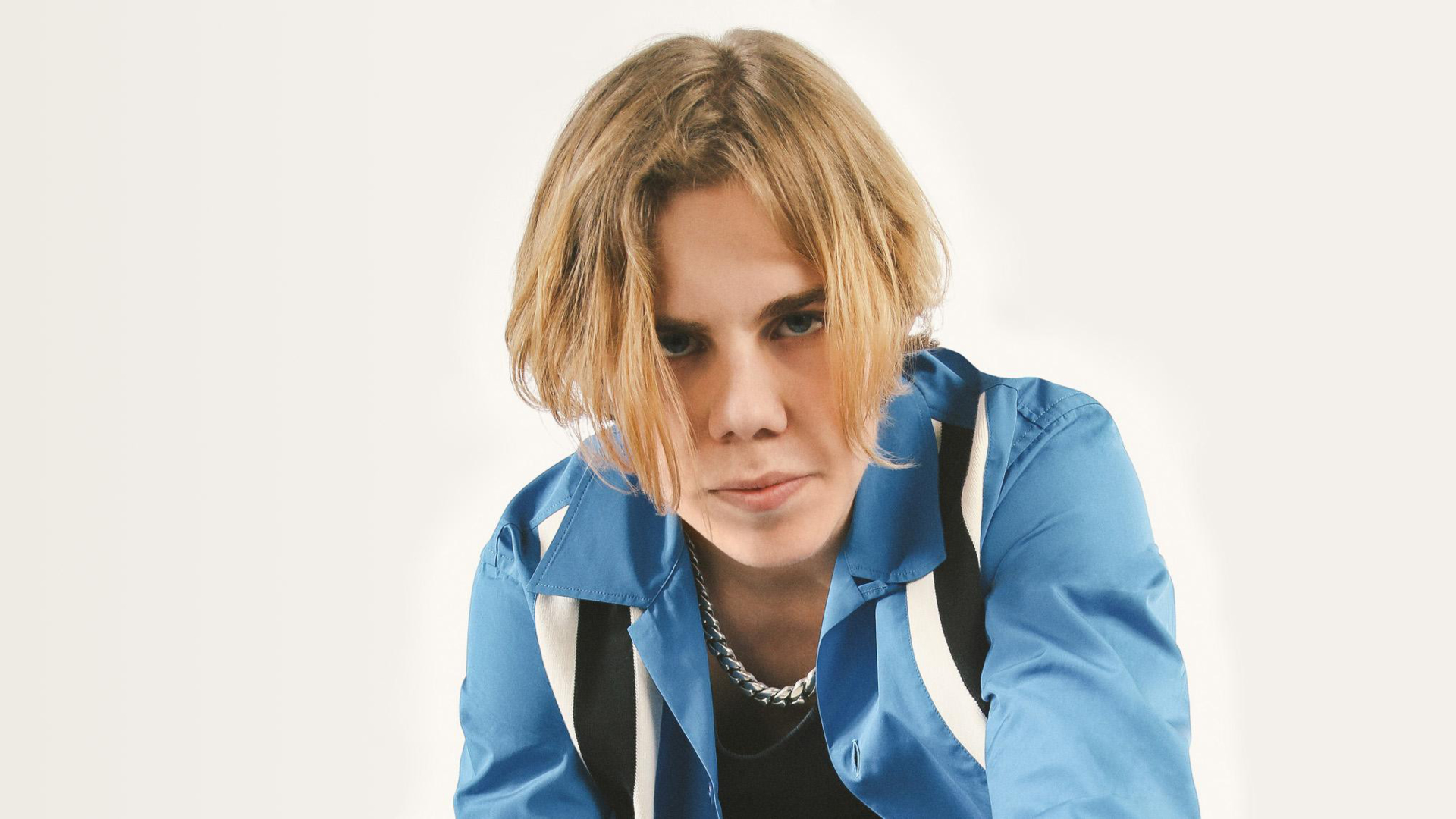 The Kid LAROI in a blue jacket HD Wallpaper